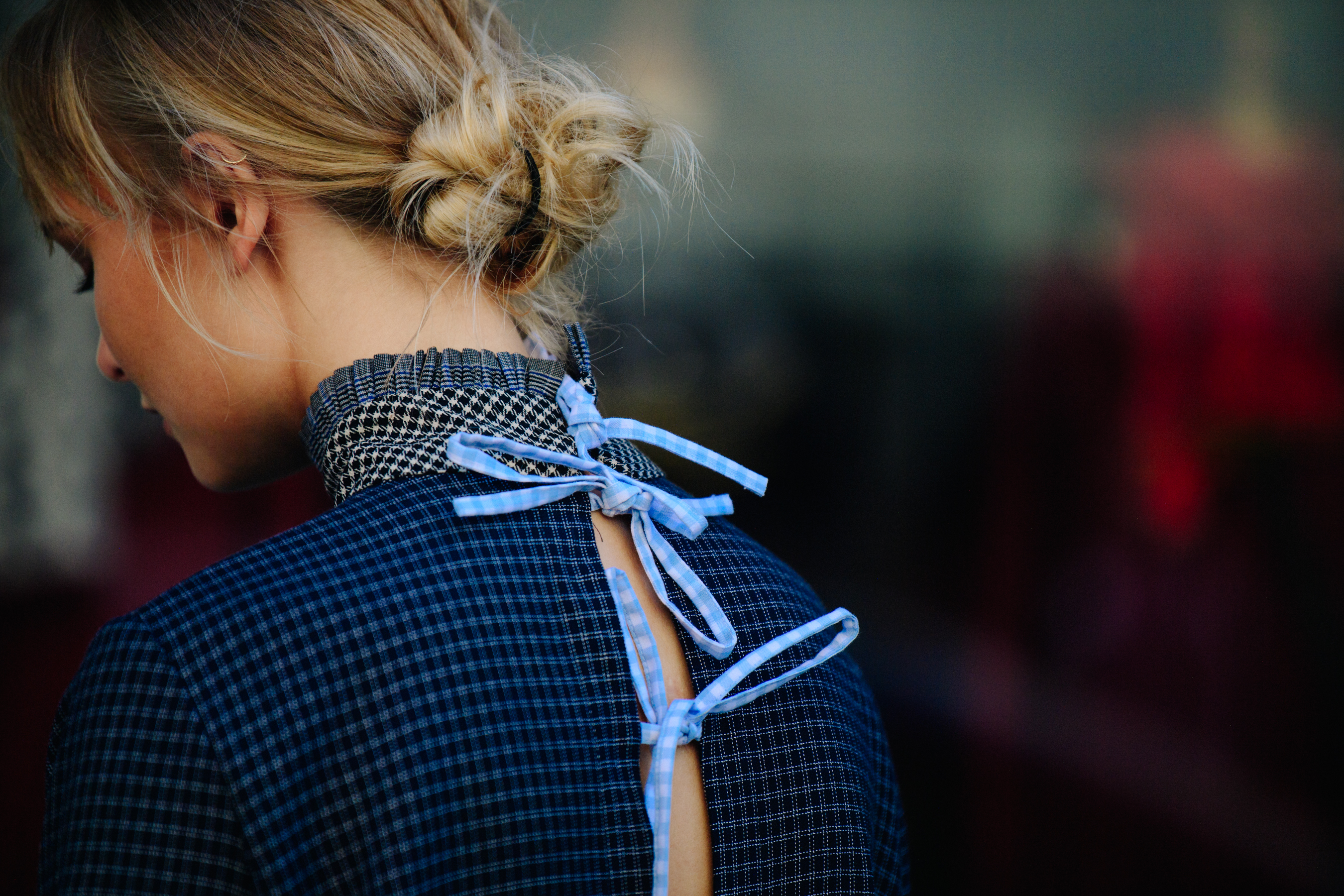 Woman wearing blue tied dress