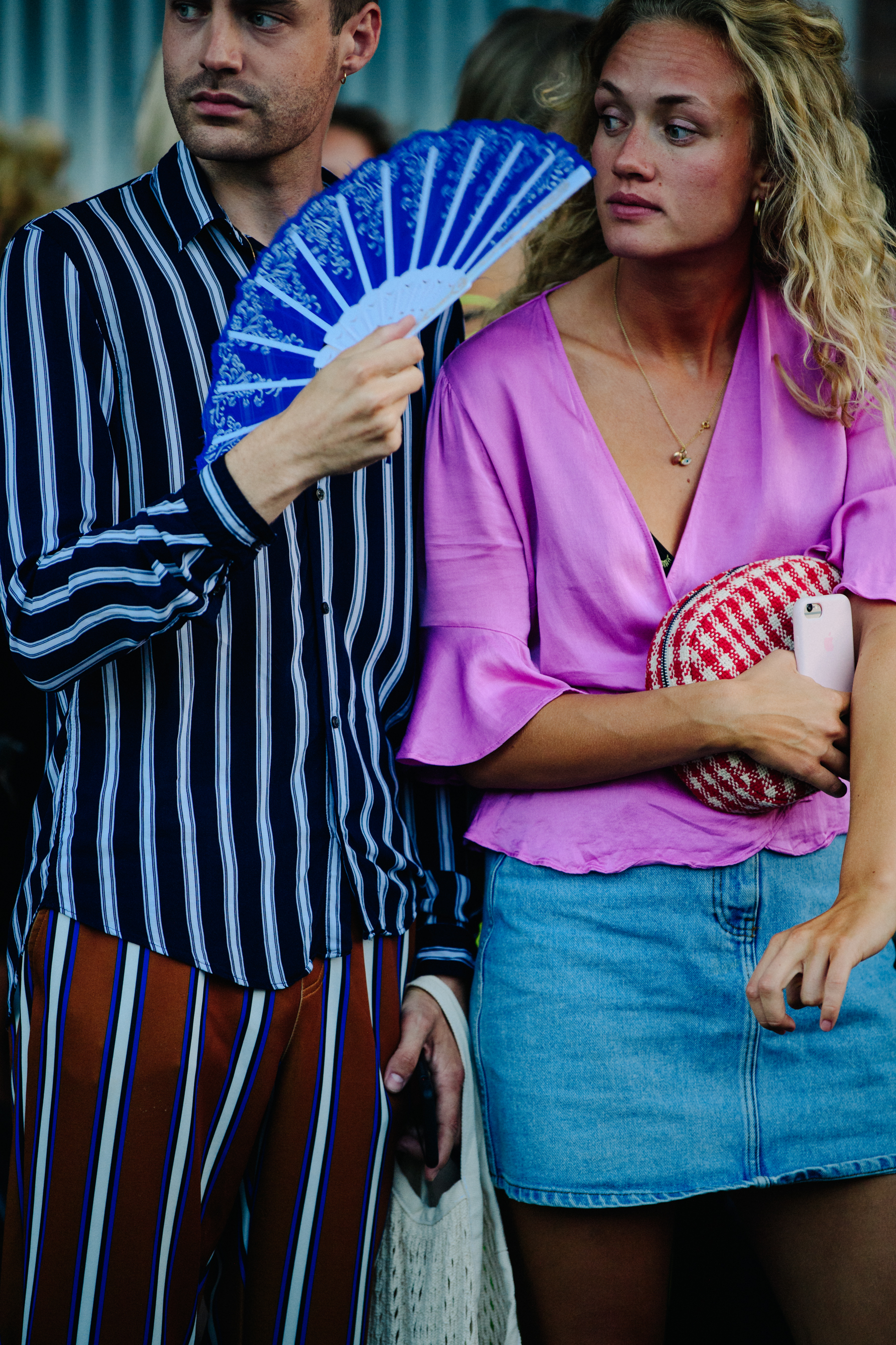 Couple holding colourful fan
