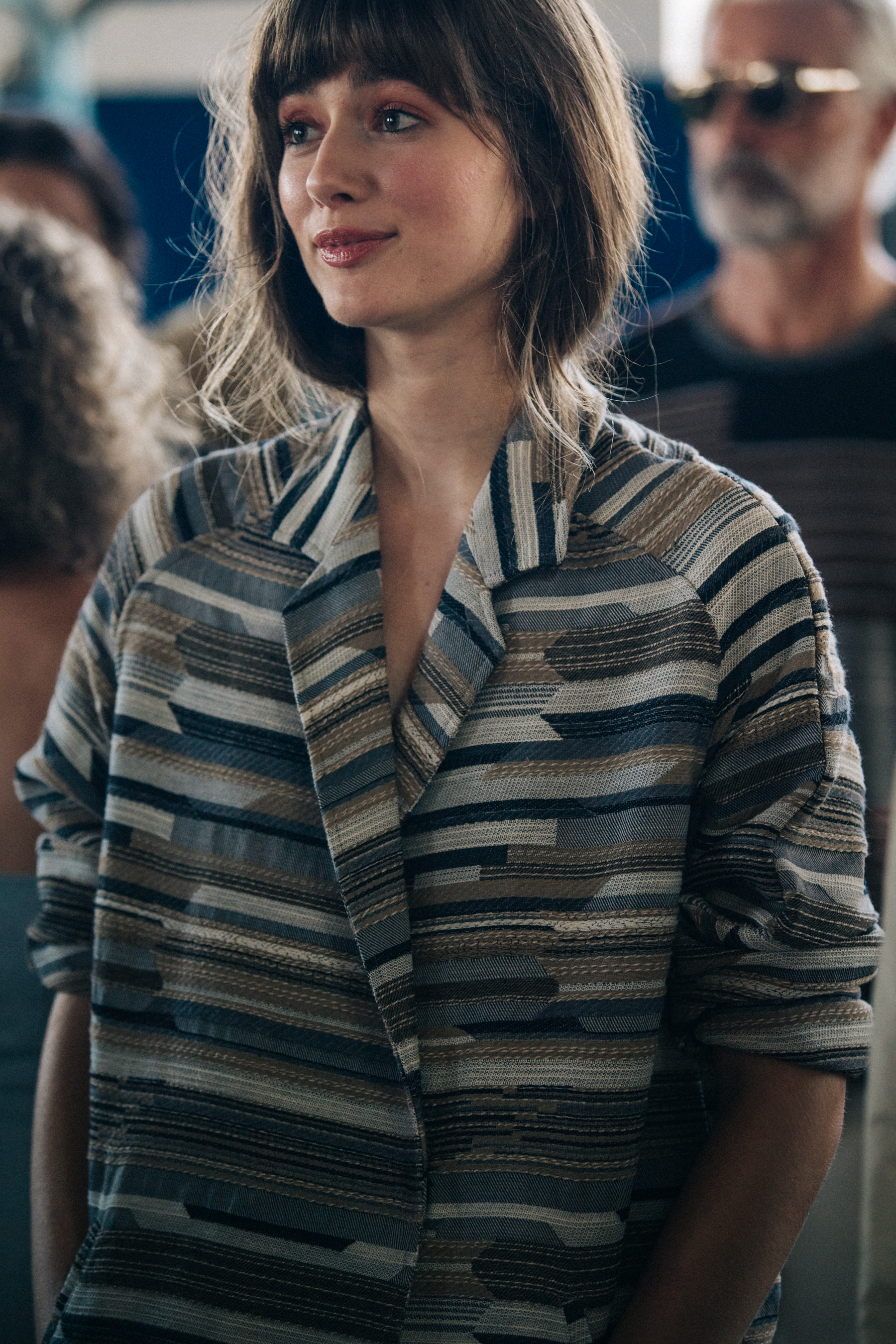 Models wearing striped outfits backtage at Billy Reid