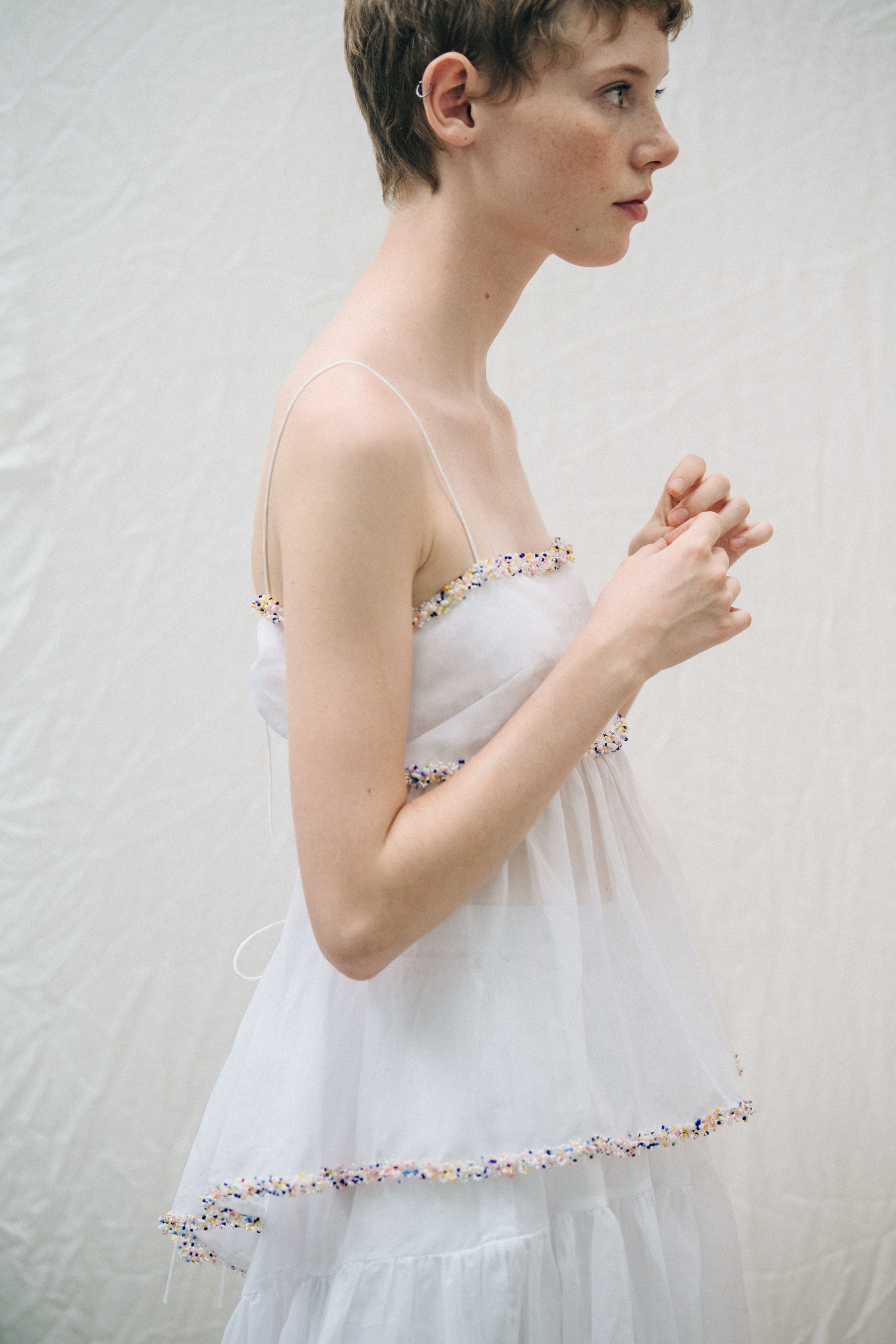 Model wearing white Cecilie Bahnsen dress