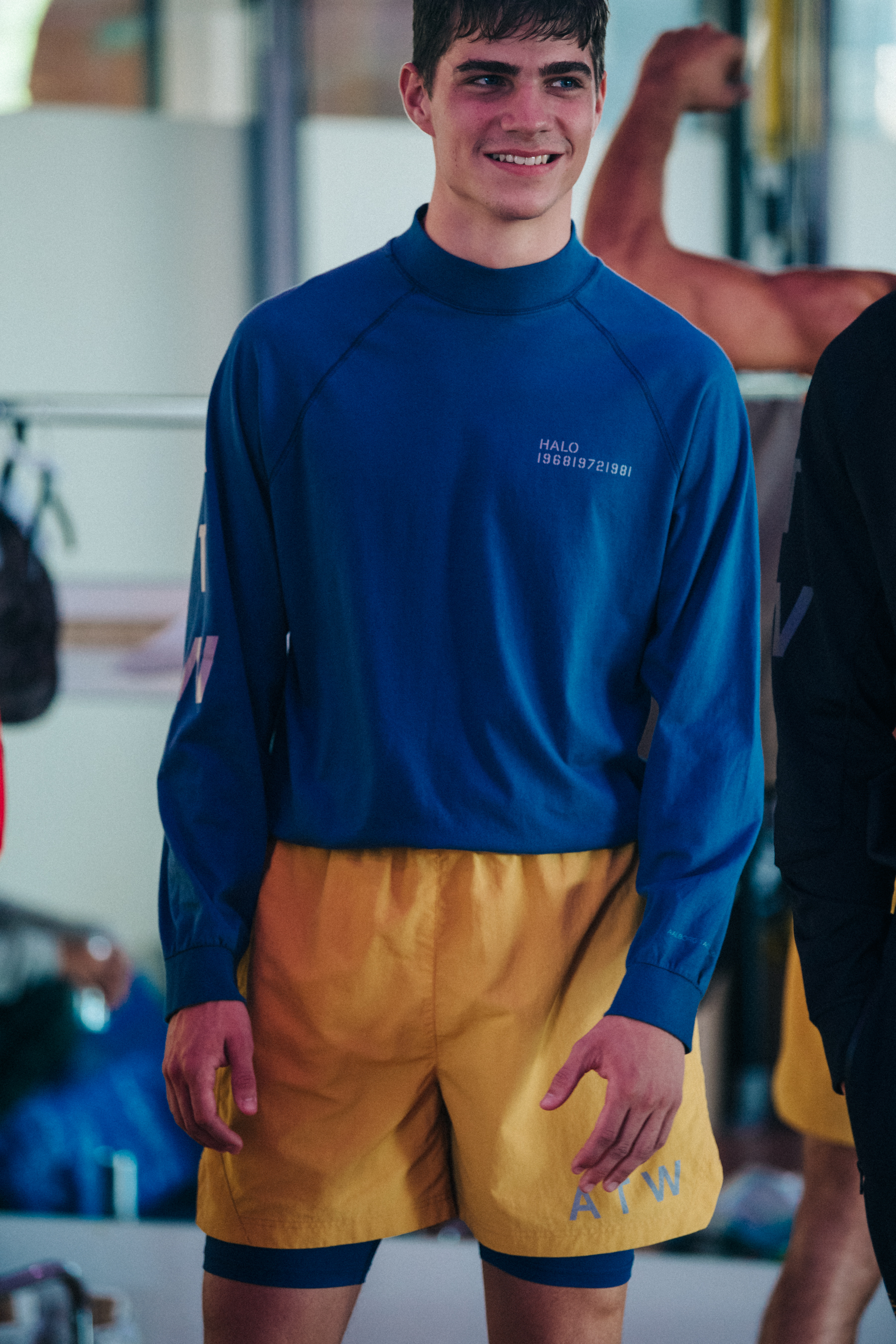 Models wearing blue and yellow at HALO