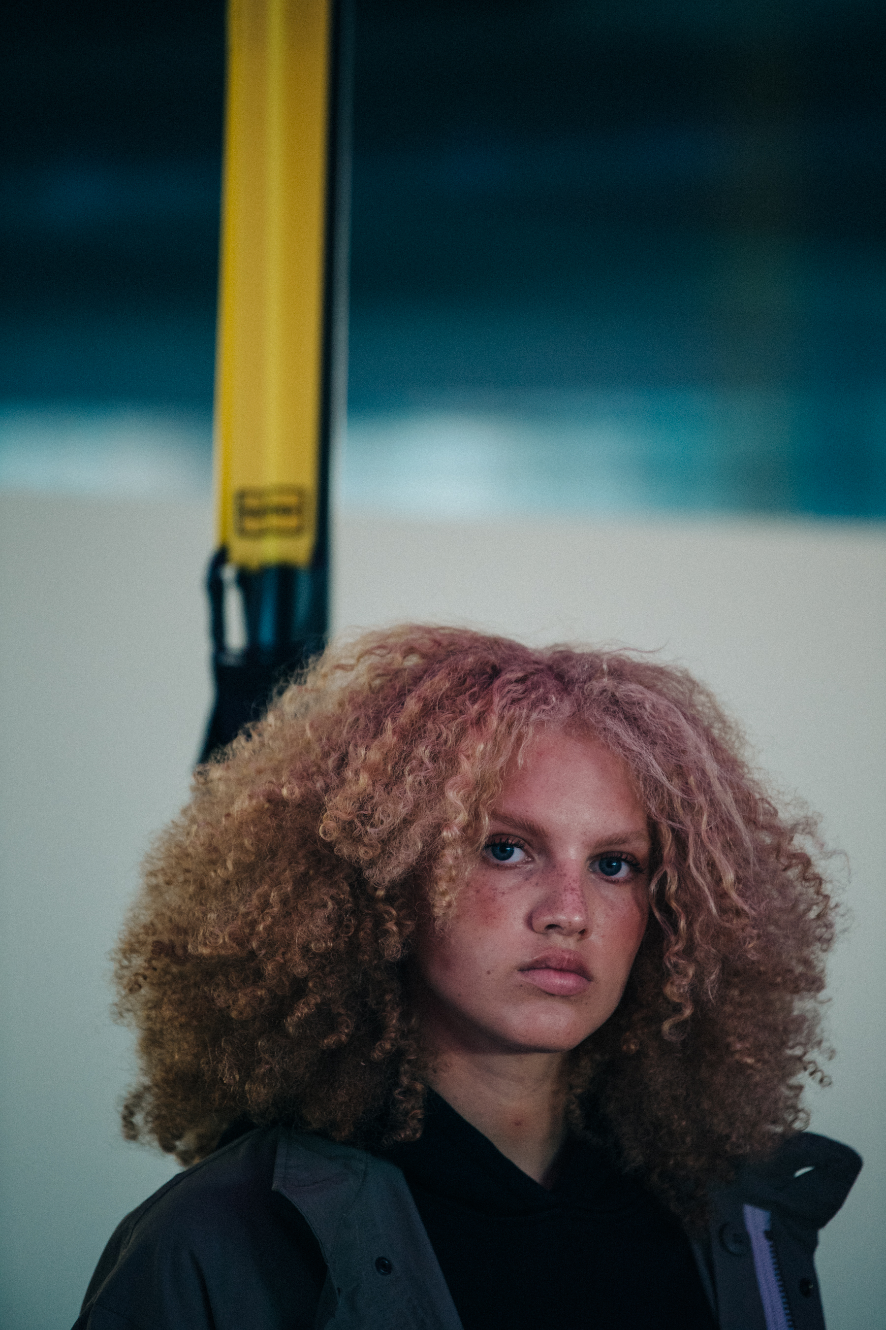 Model with light curly hair