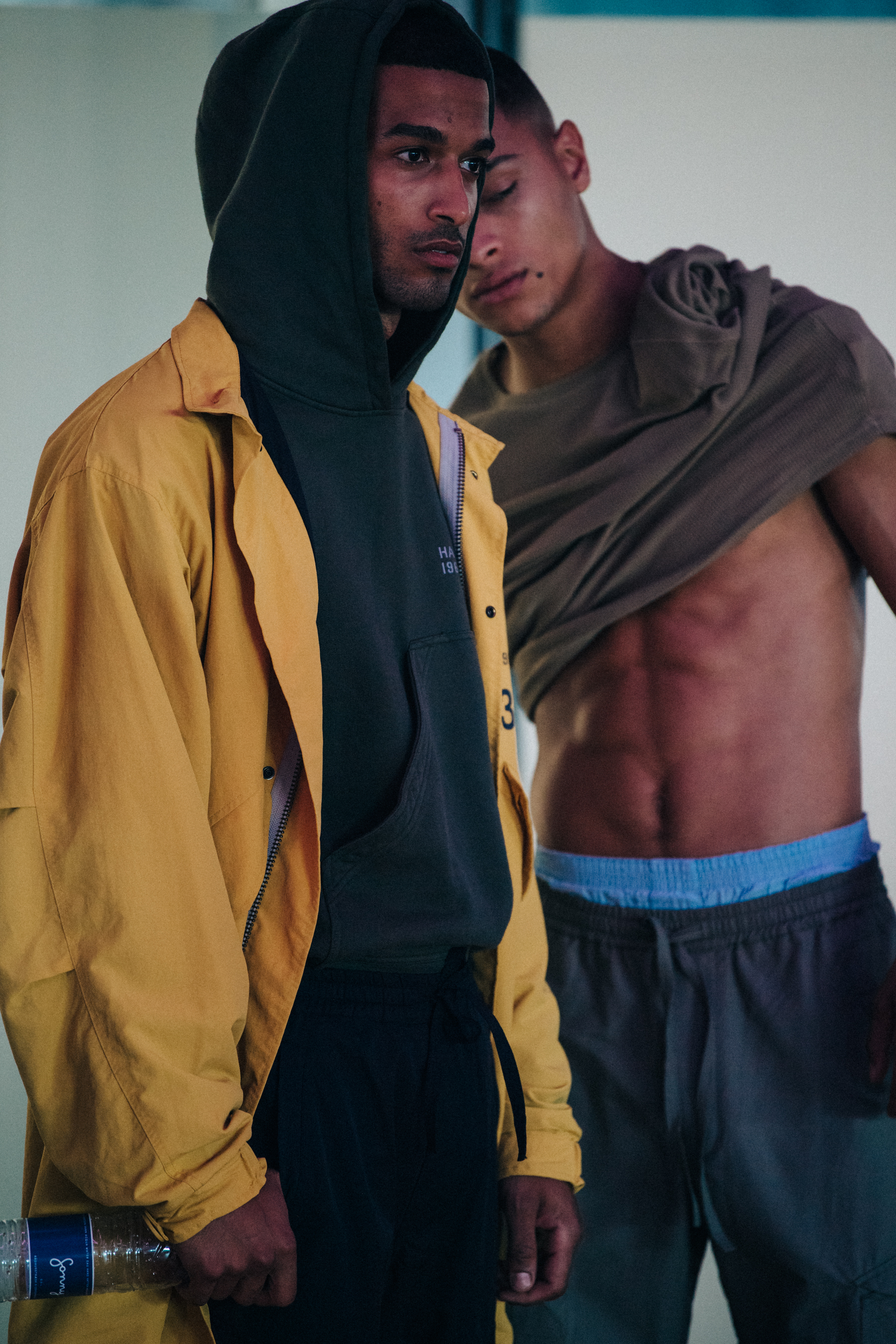 Model wearing yellow coach jacket