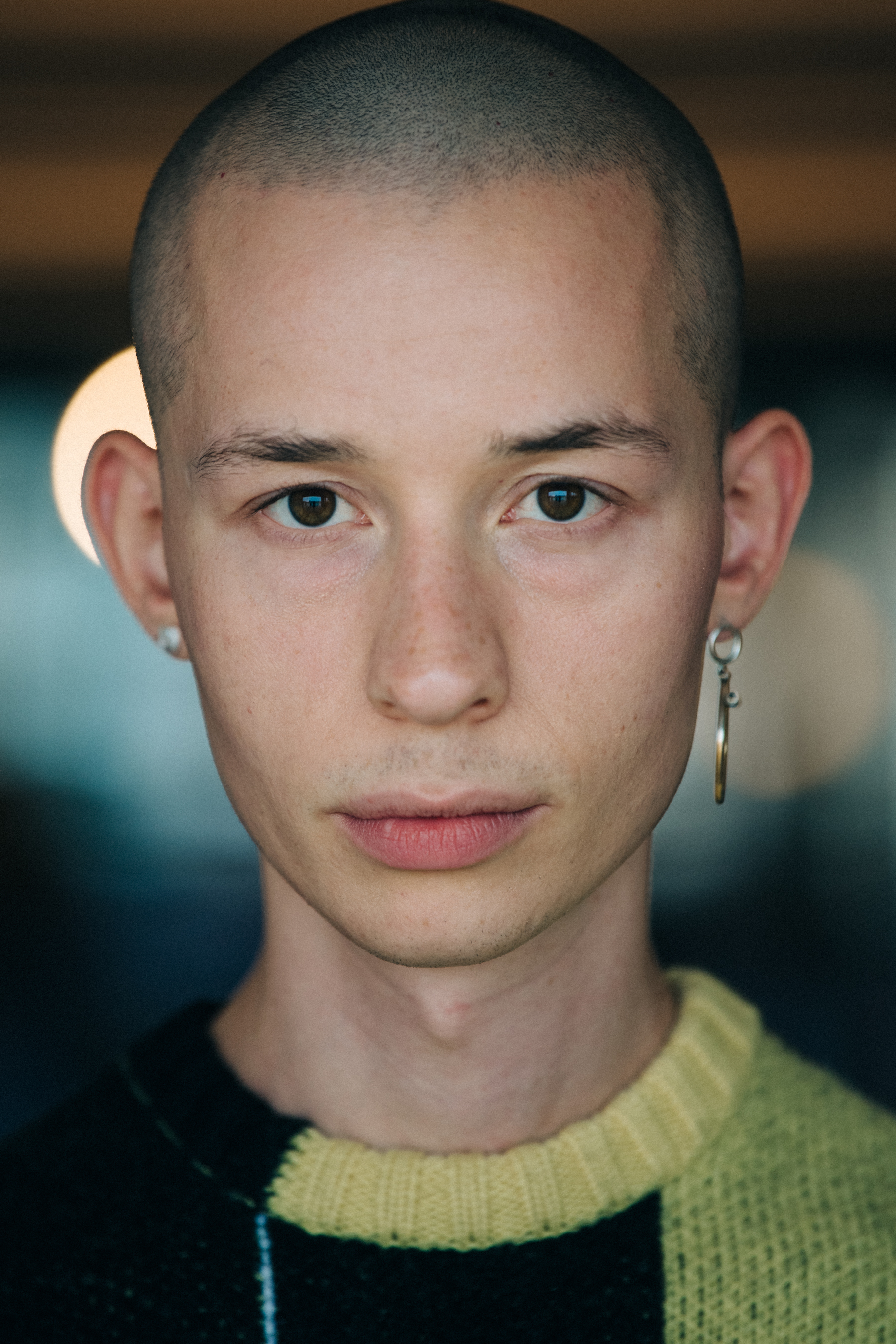 Portrait of model with shaved head