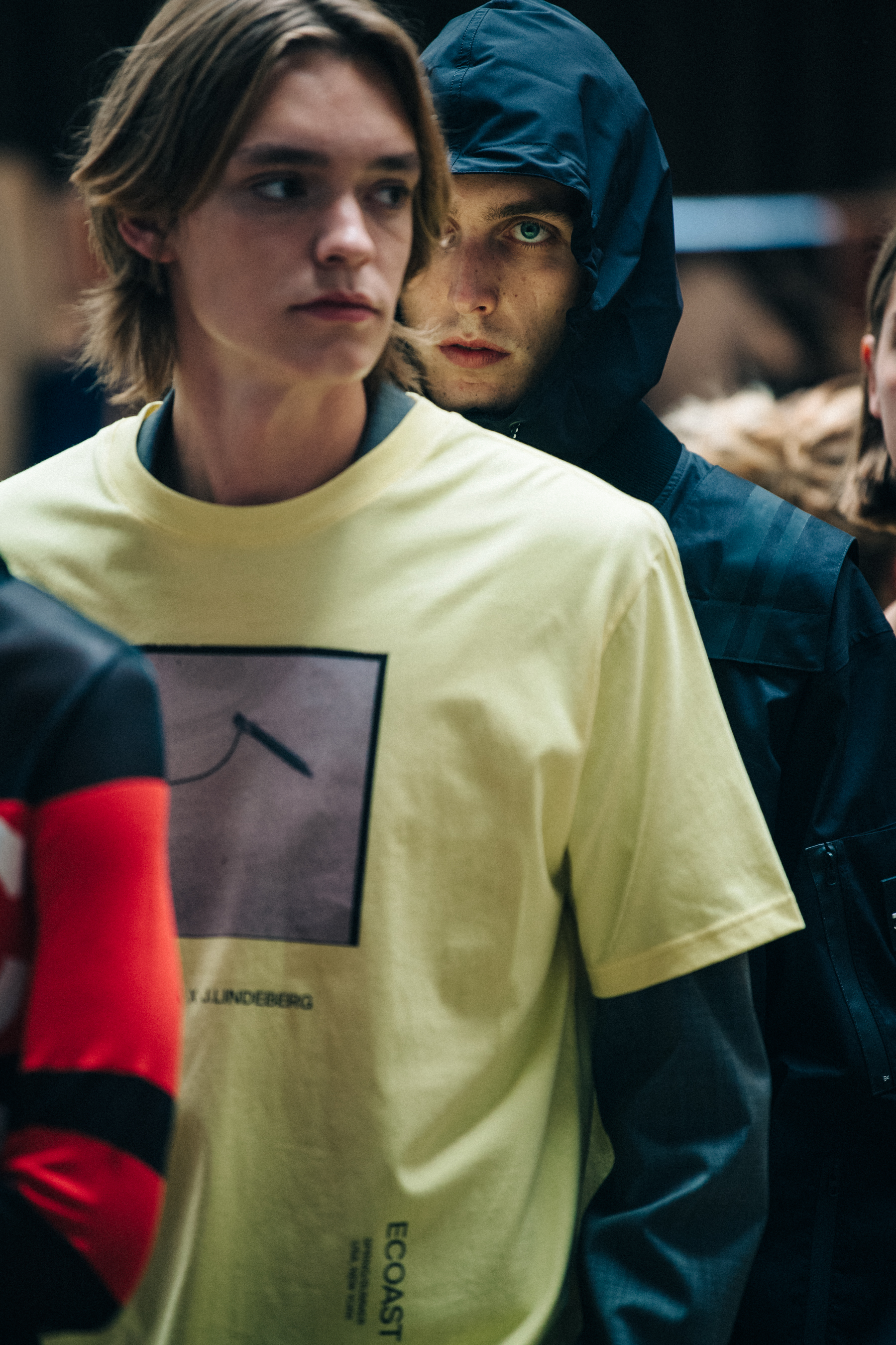 Models wearing black and yellow at J Lindeberg