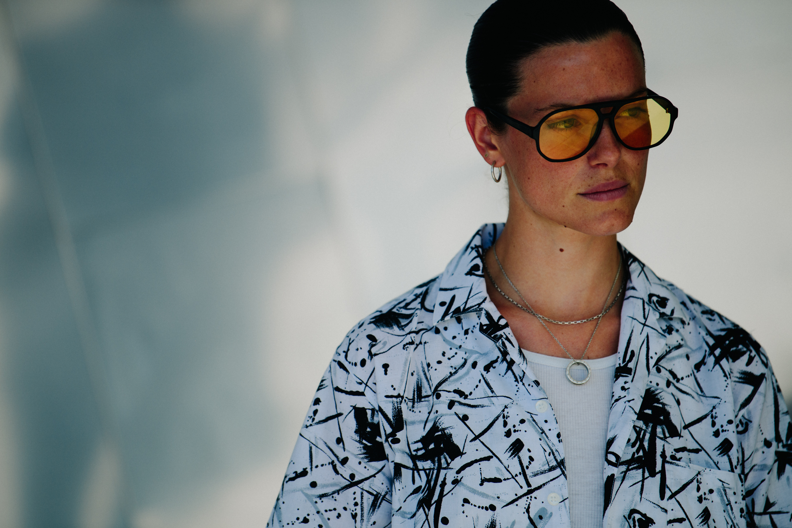 Woman wearing yellow sunglasses