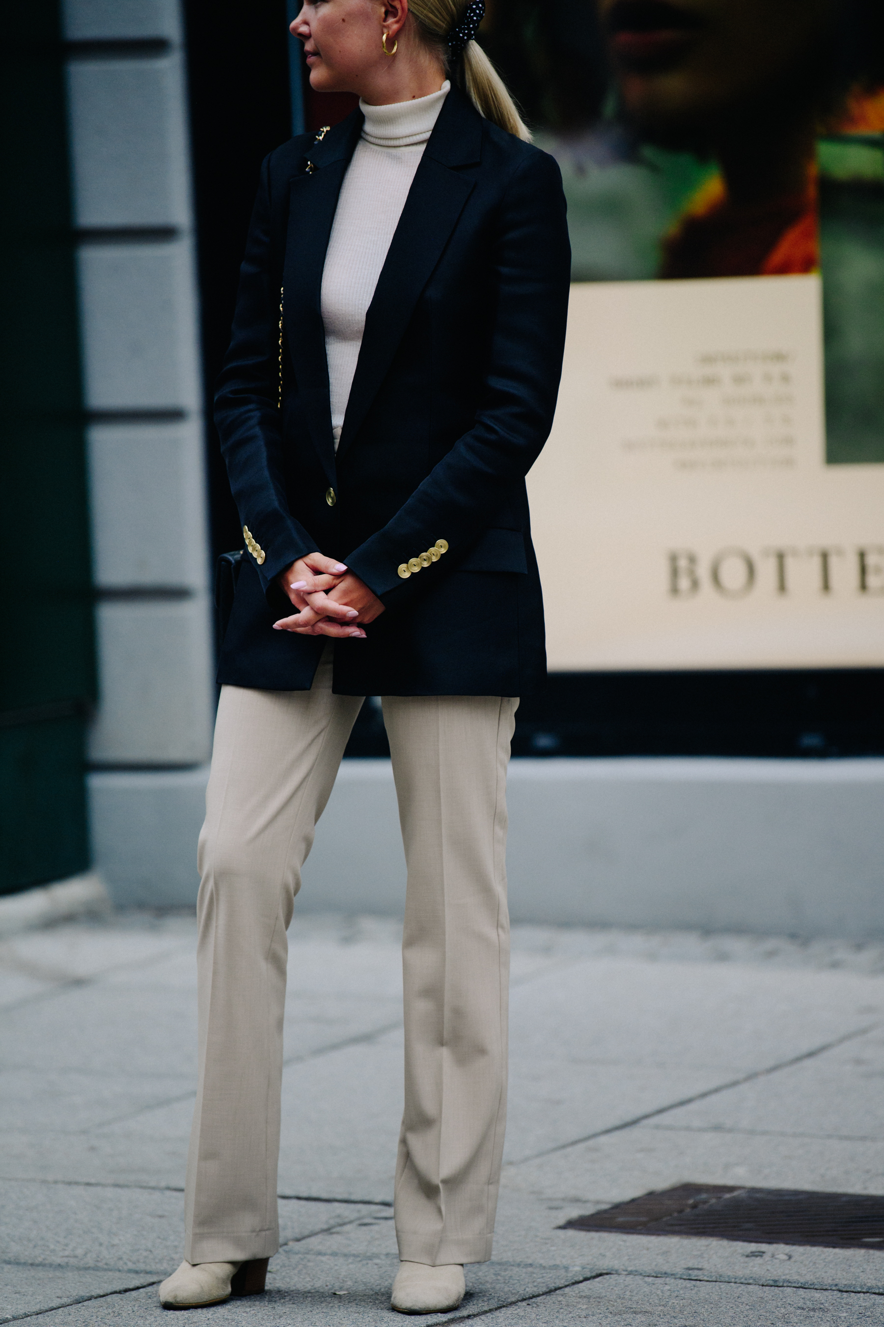 Woman wearing navy blazer