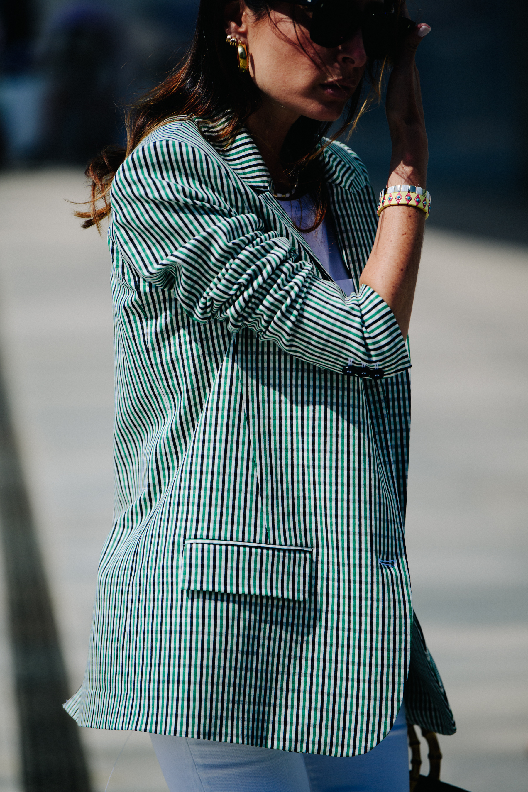 Woman wearing striped jacket