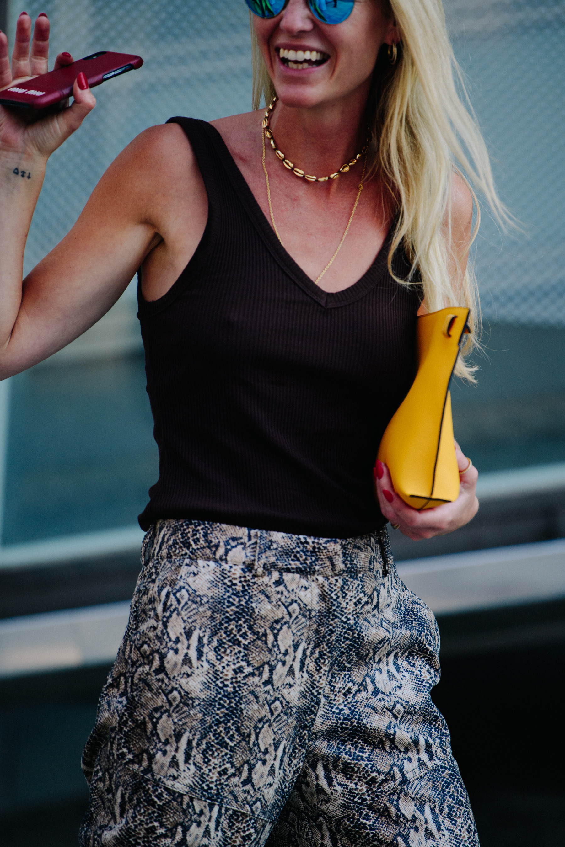 Woman carrying yellow bag