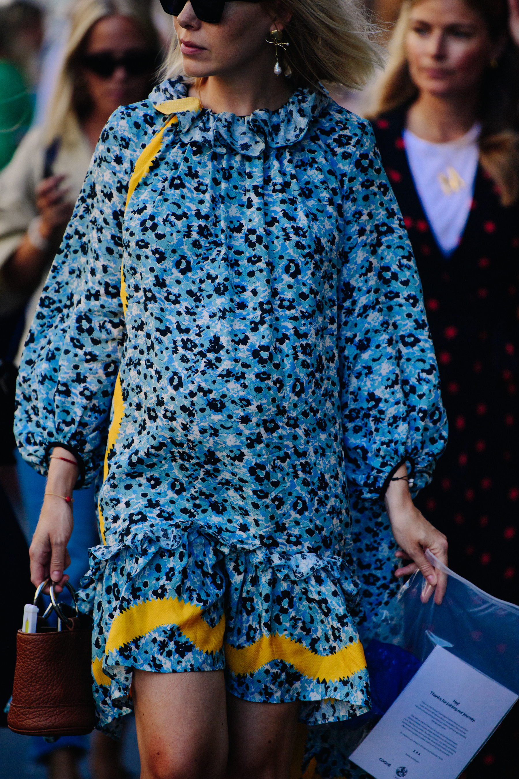 Woman wearing blue floral dress