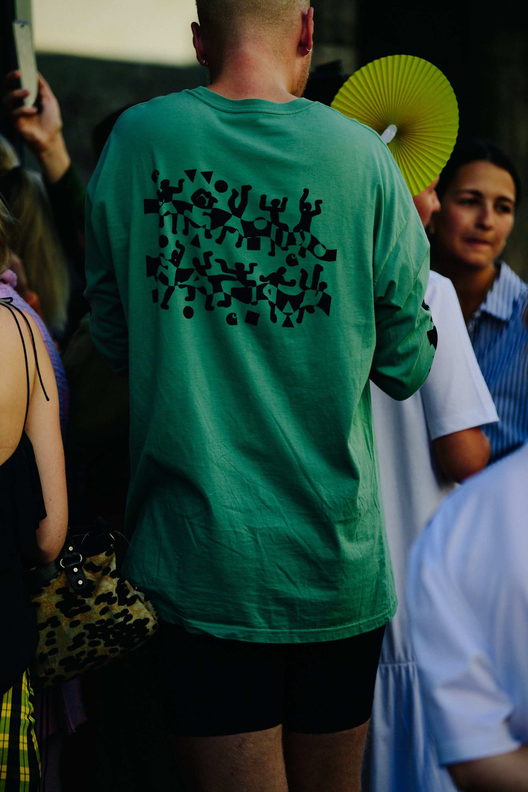 Man wearing green tee shirt