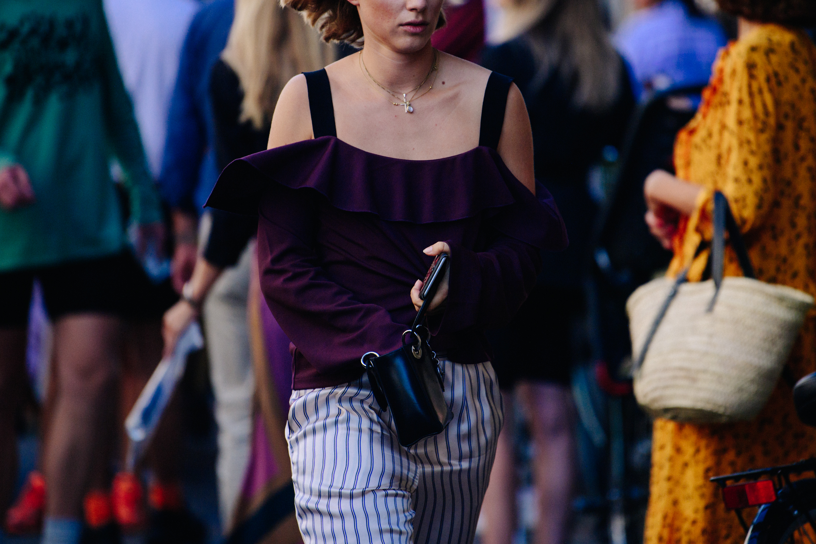 Woman wearing purple top