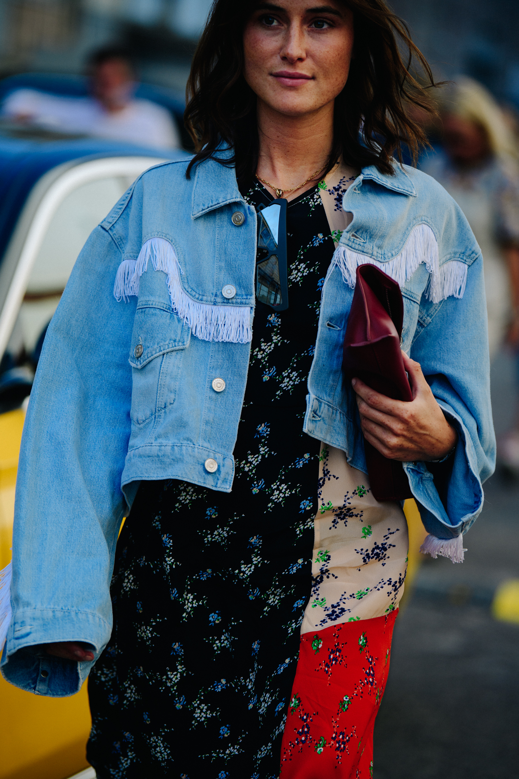 Woman wearing cropped denim jacket