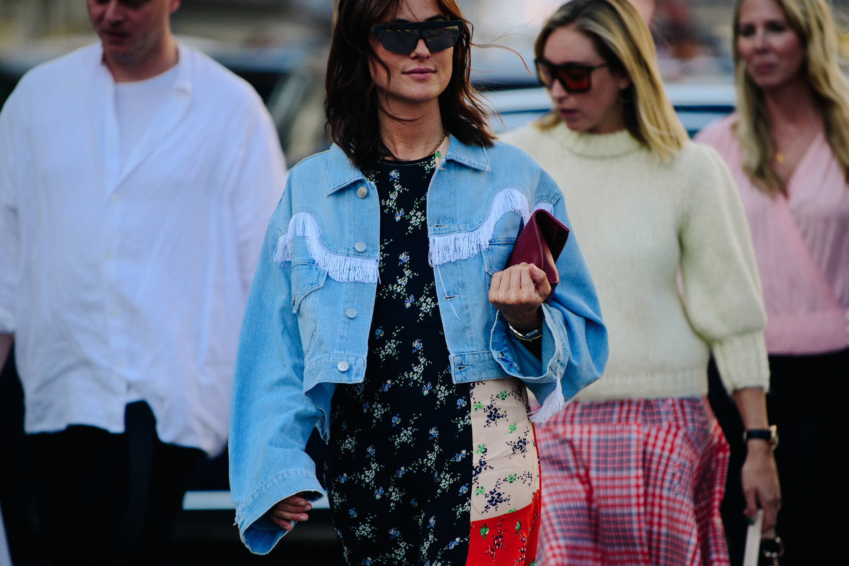 Woman wearing cropped denim jacket