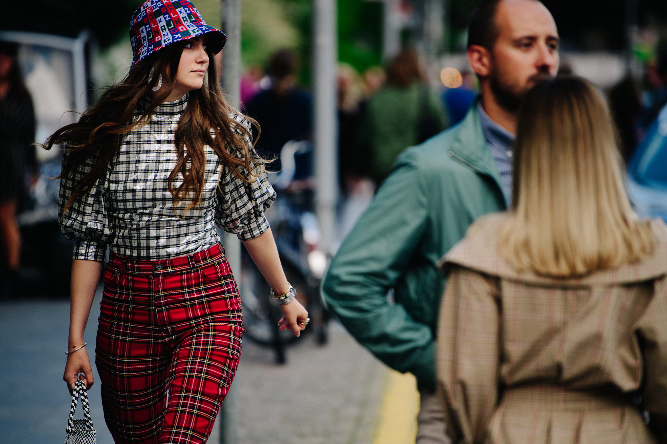 Woman wearing red check pants