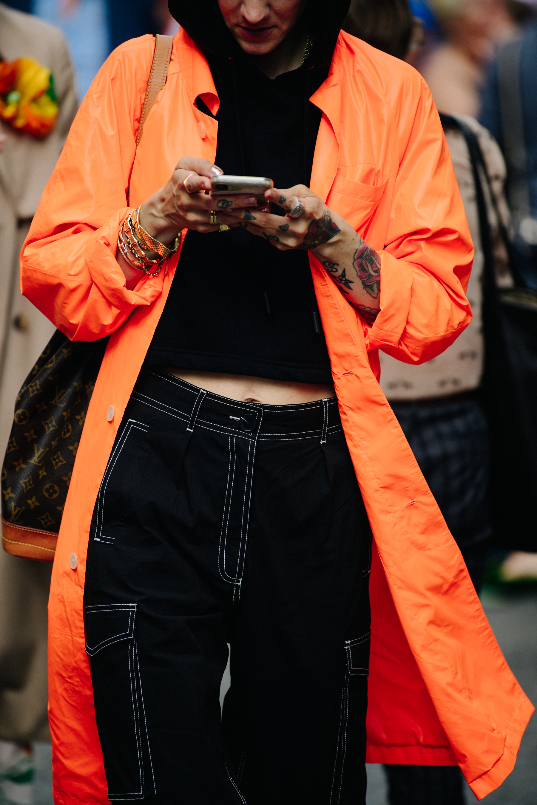 Woman wearing orange coat