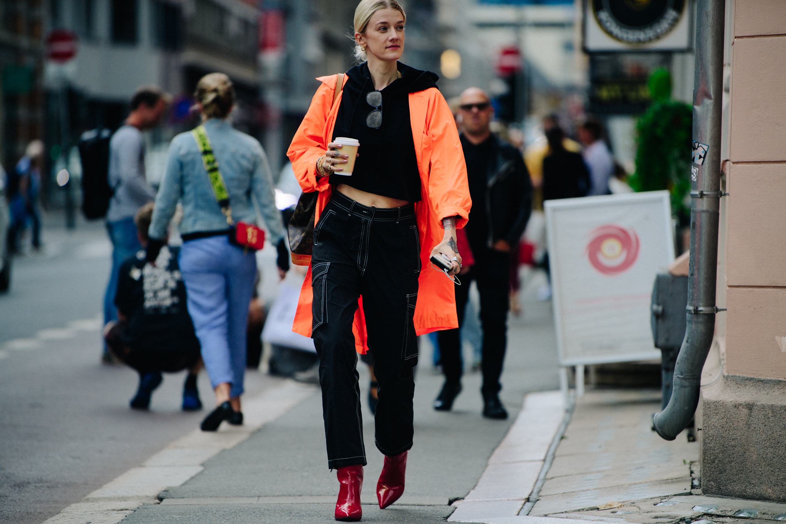 Woman wearing orange coat