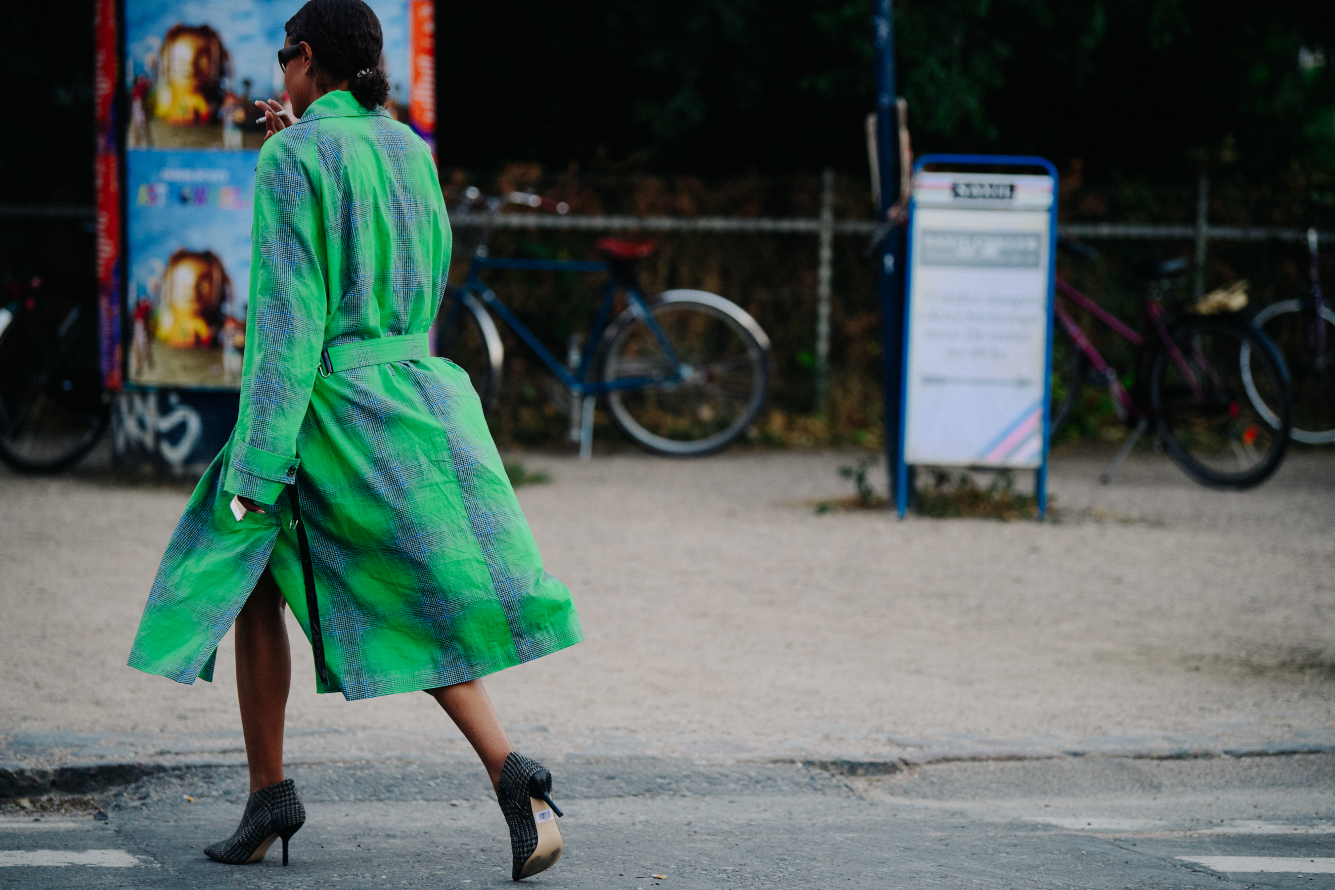Woman wearing green check coat