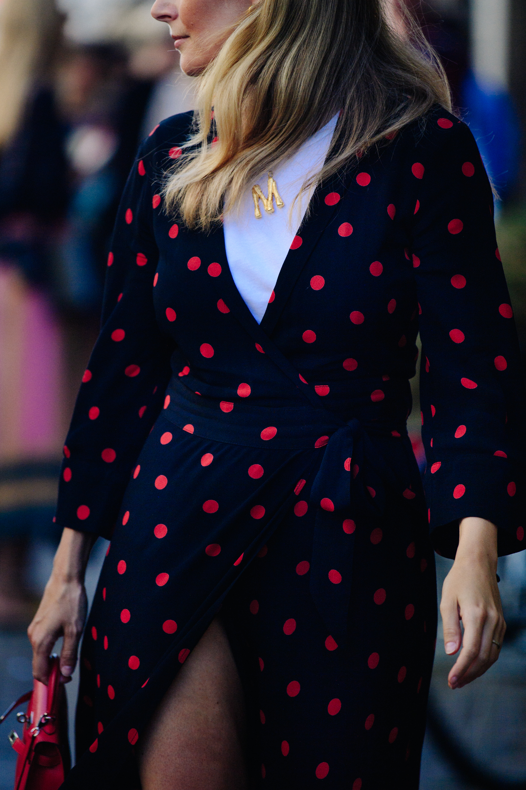 Woman wearing red spot dress