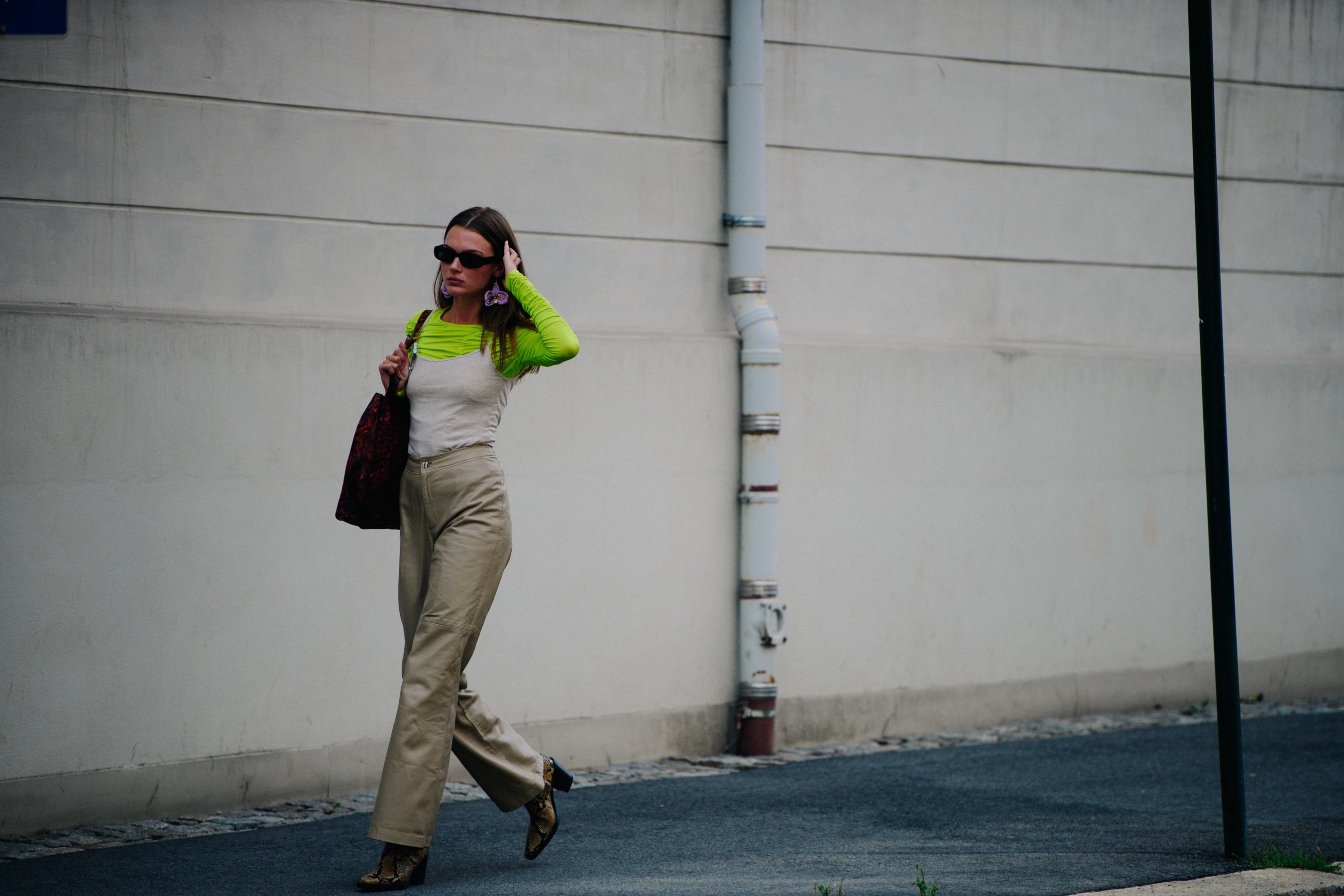 Woman wearing long tan pants