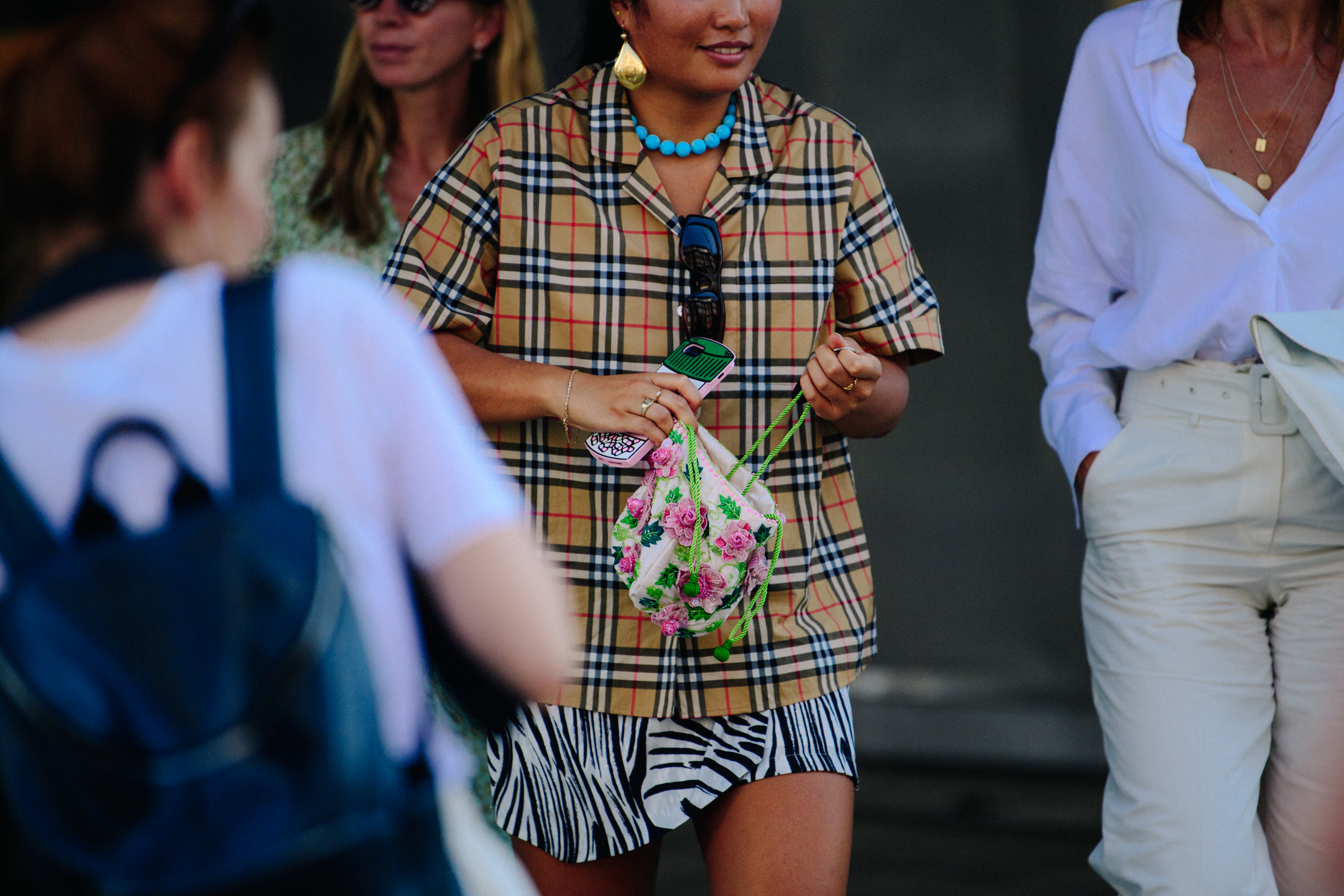 Woman wearing Burberry shirt