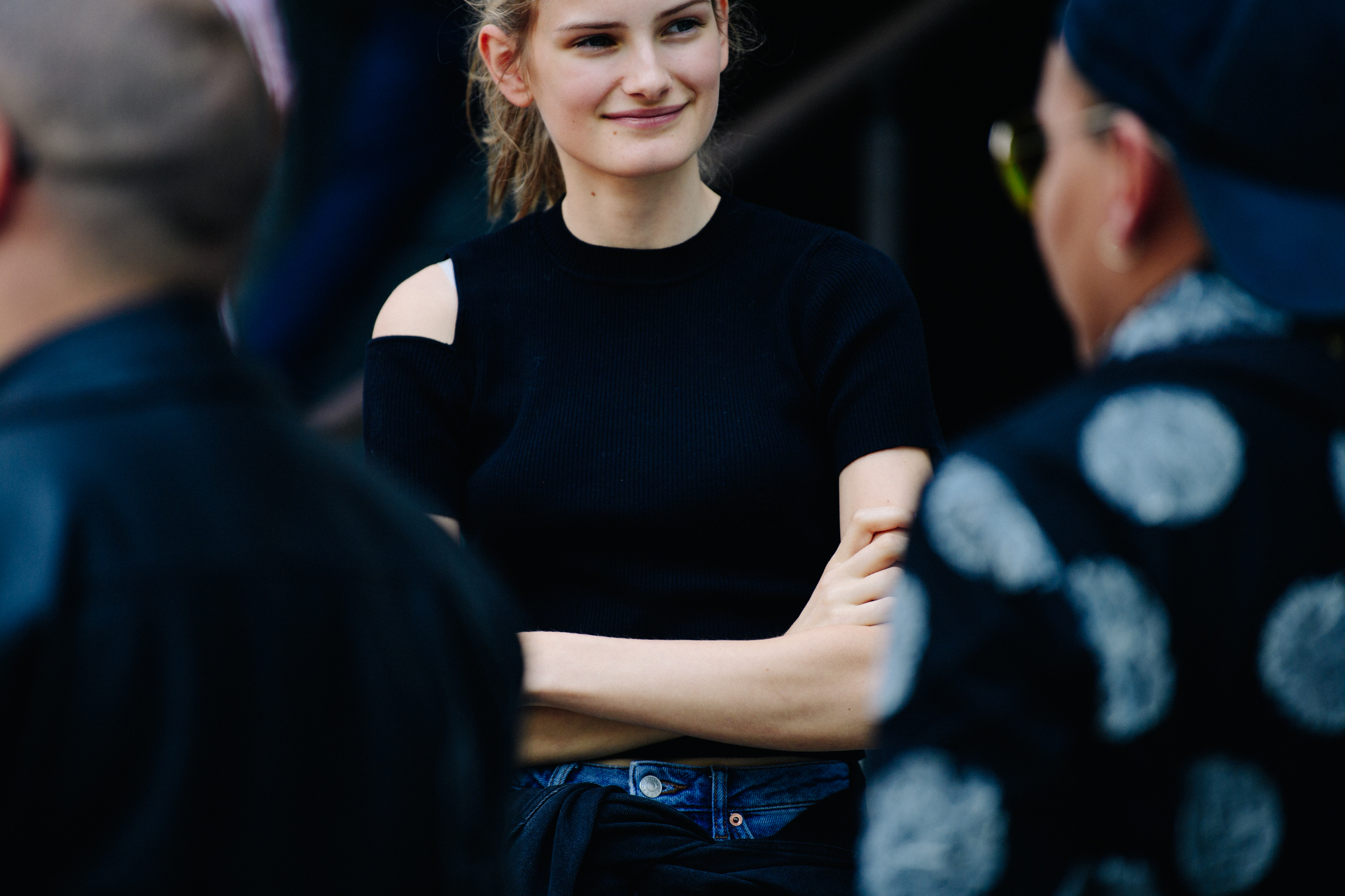 Model wearing black top