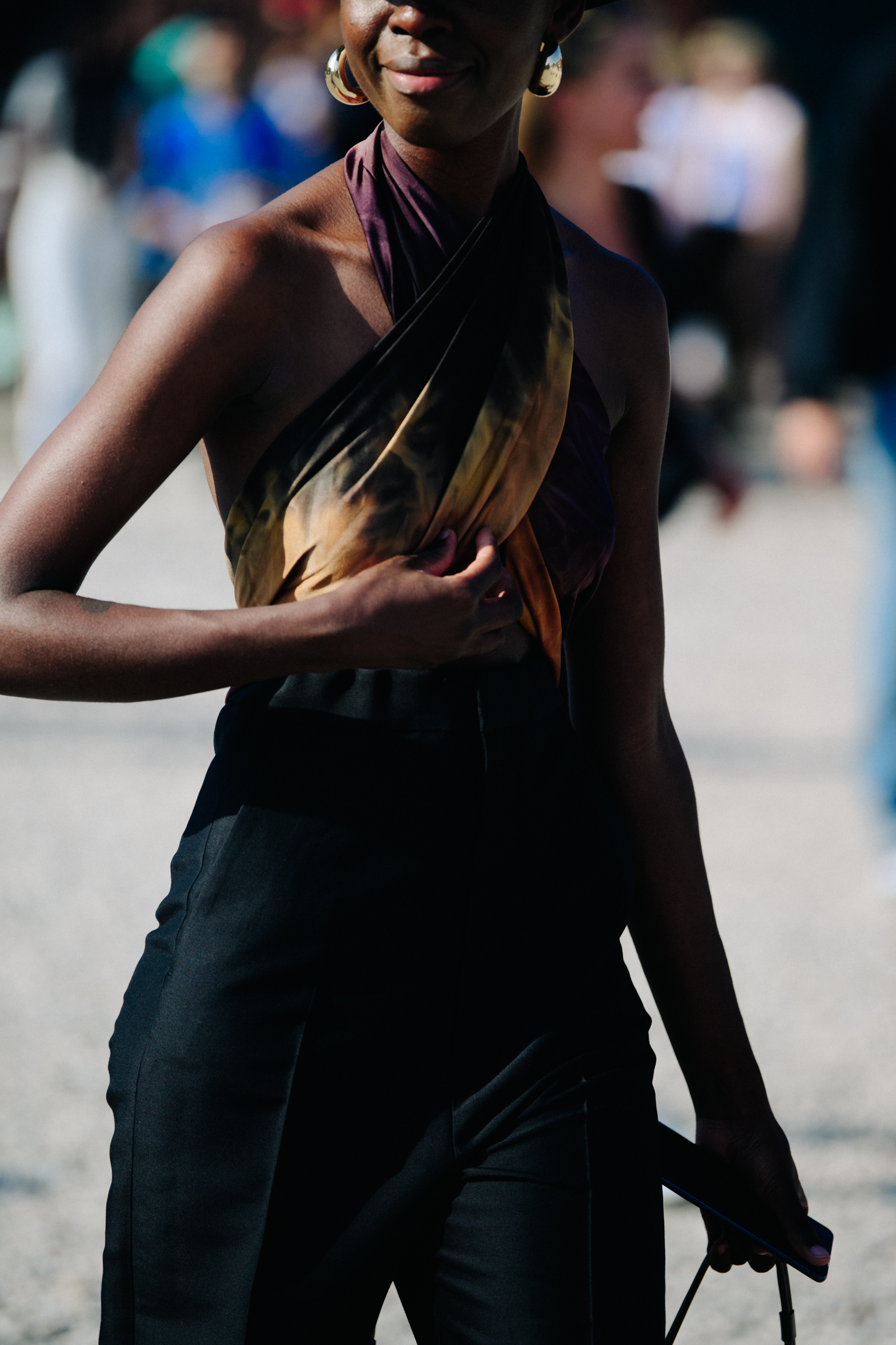 Woman wearing gold earrings