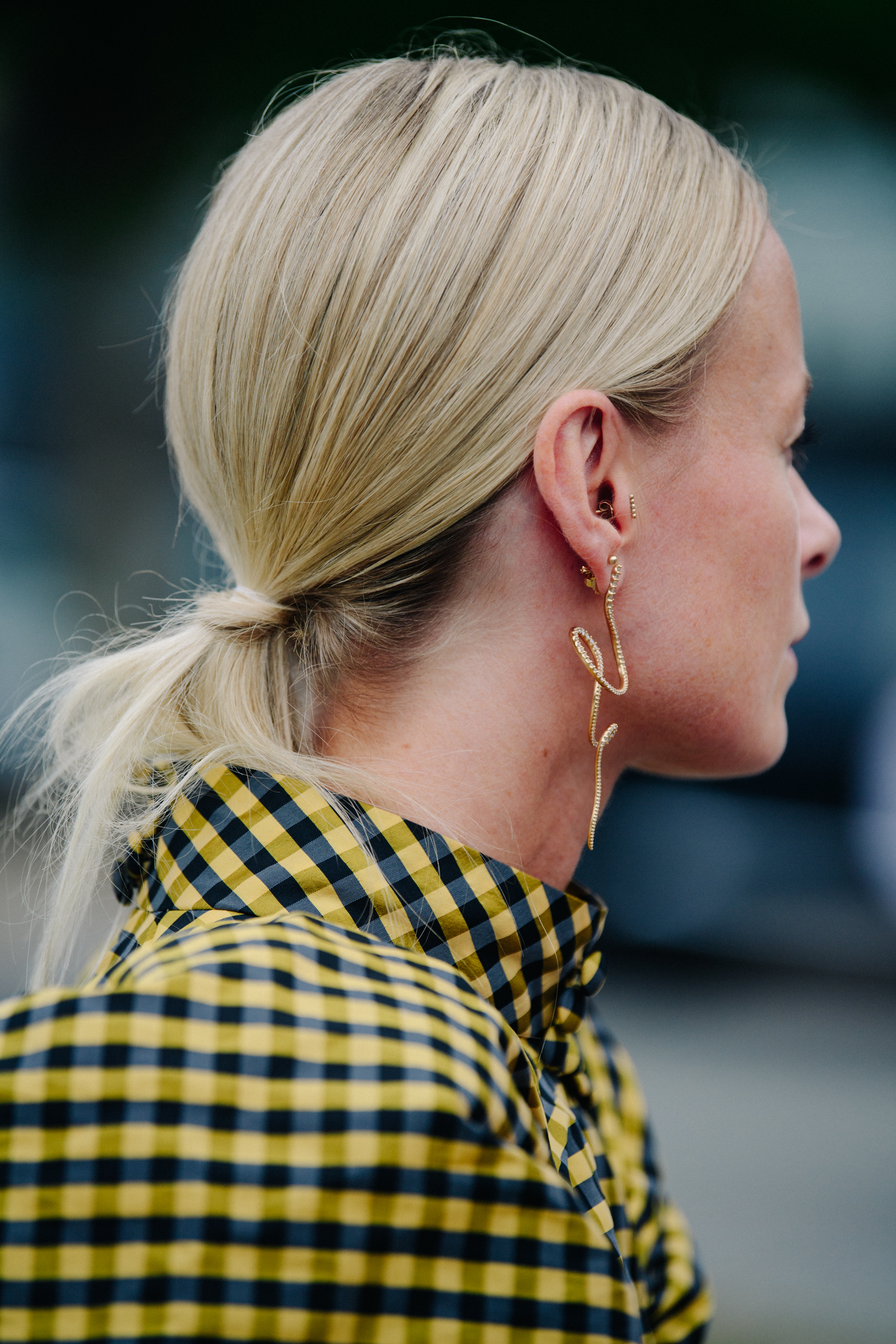 Woman wearing yellow check dress
