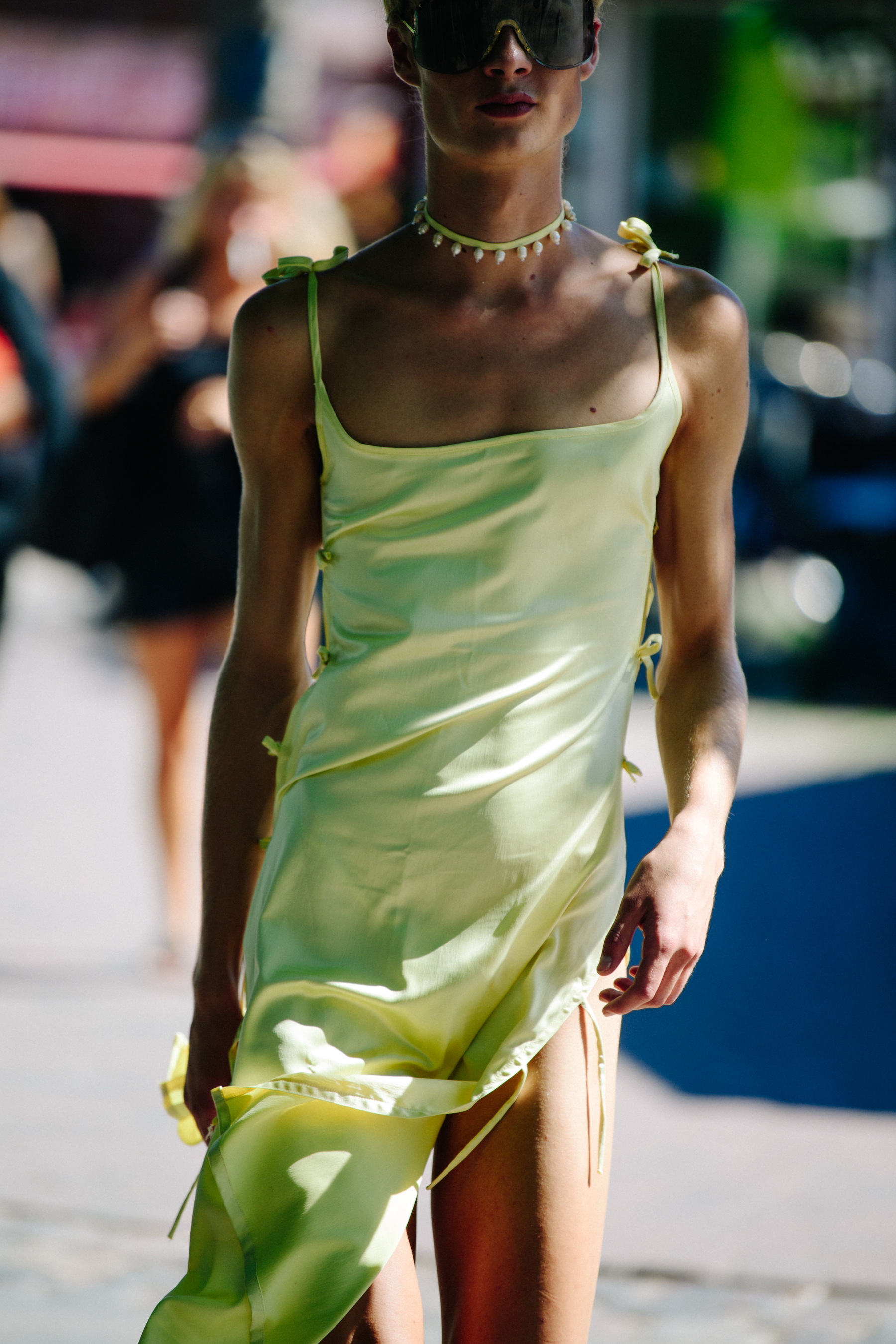 Man wearing yellow dress