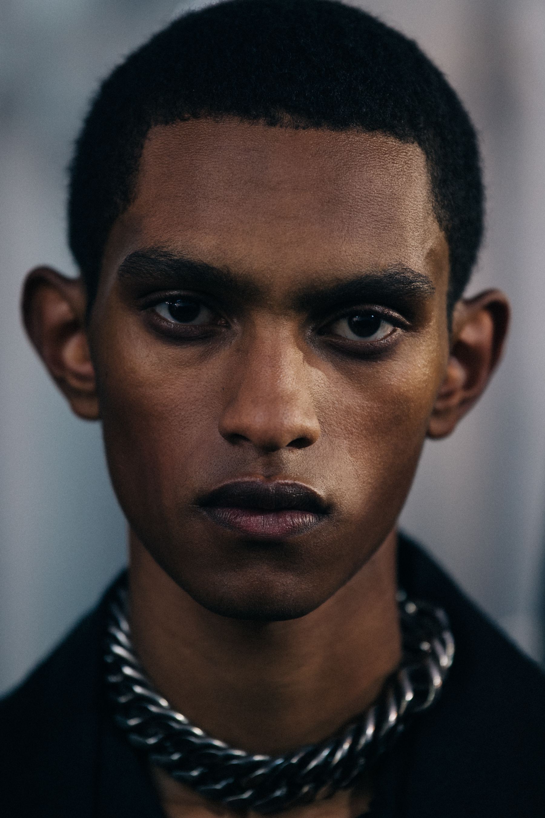 Portrait of model wearing silver chain