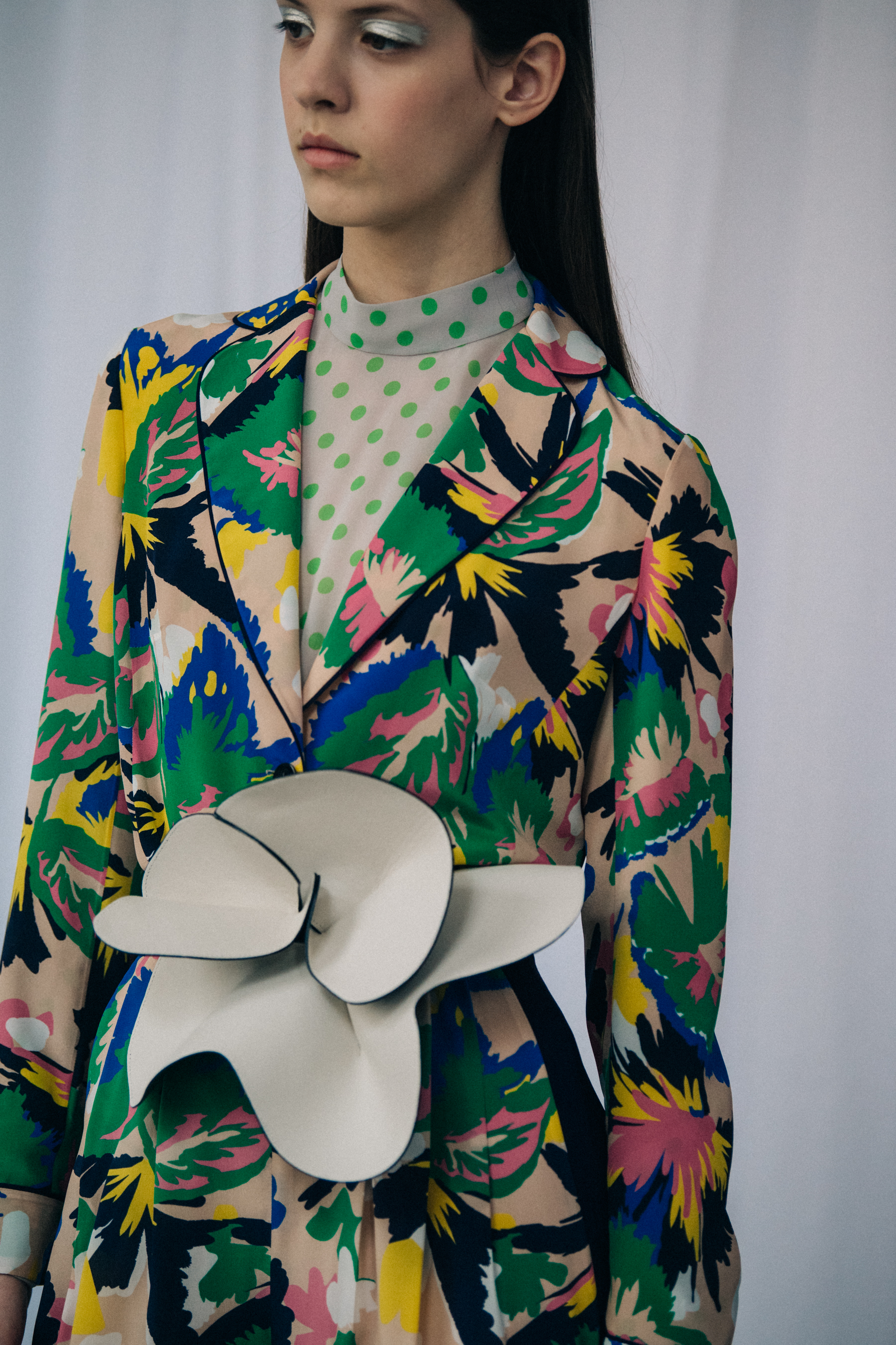 Model wearing floral patterns at Delpozo