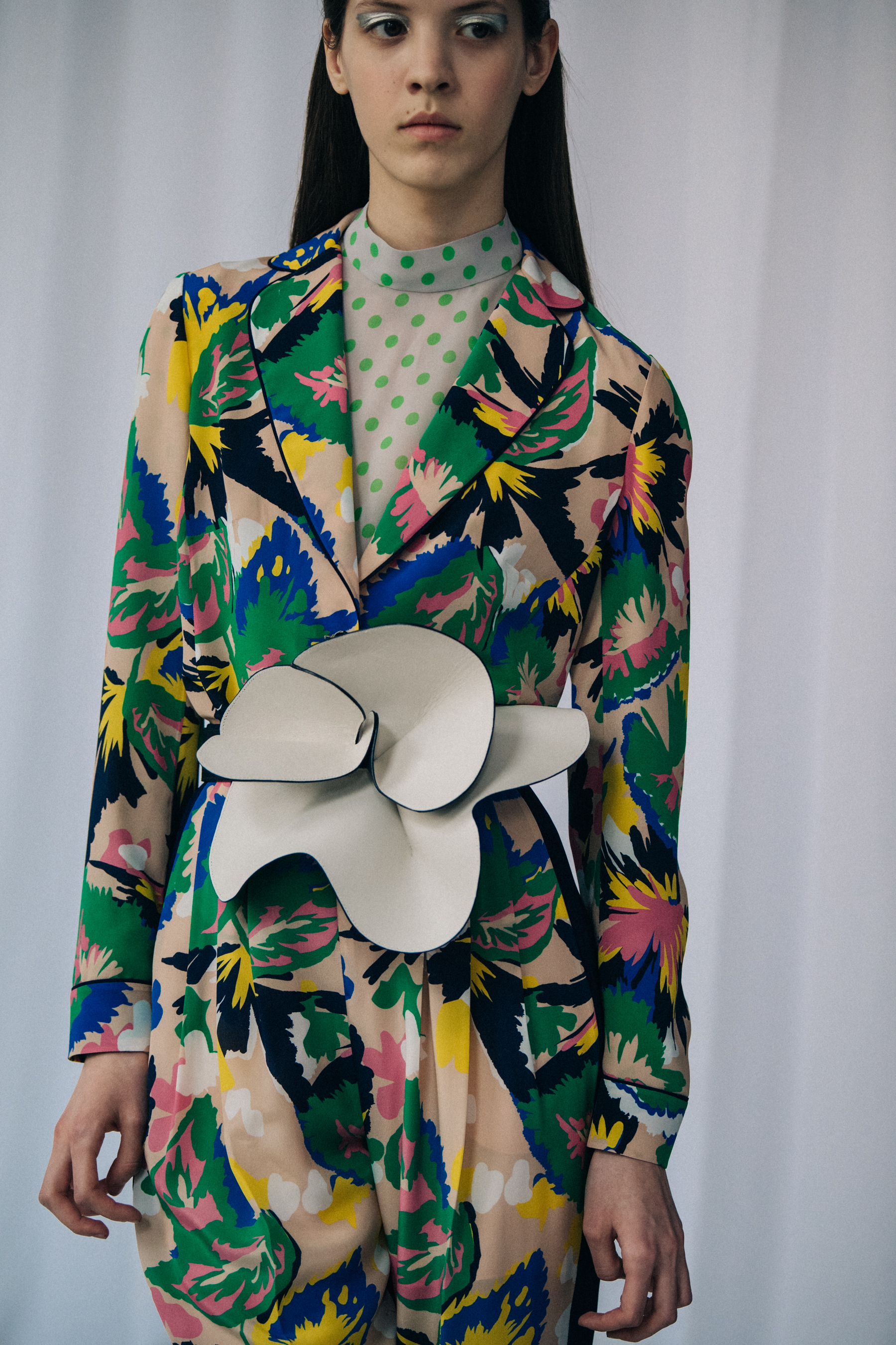 Model wearing floral patterns at Delpozo