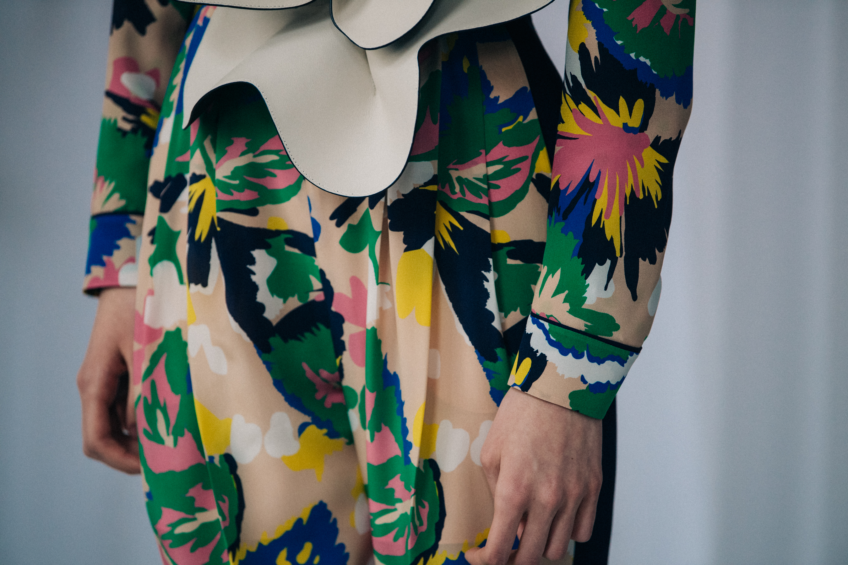 Model wearing floral patterns at Delpozo