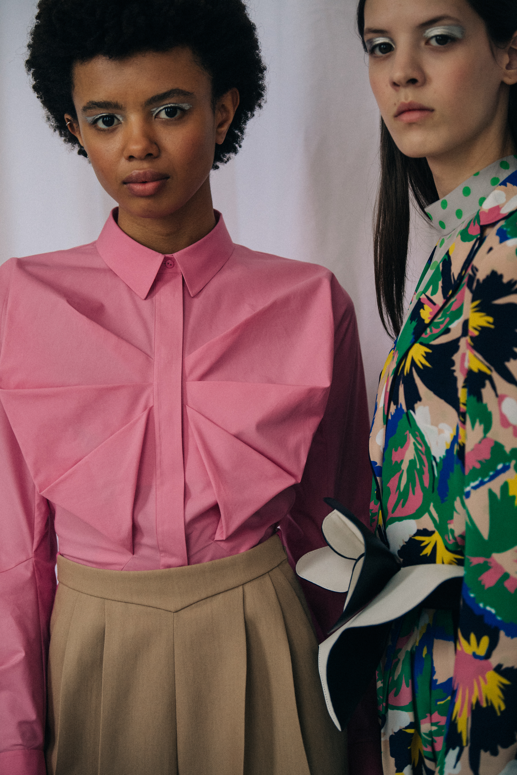 Models wearing colourful outfits at Delpozo