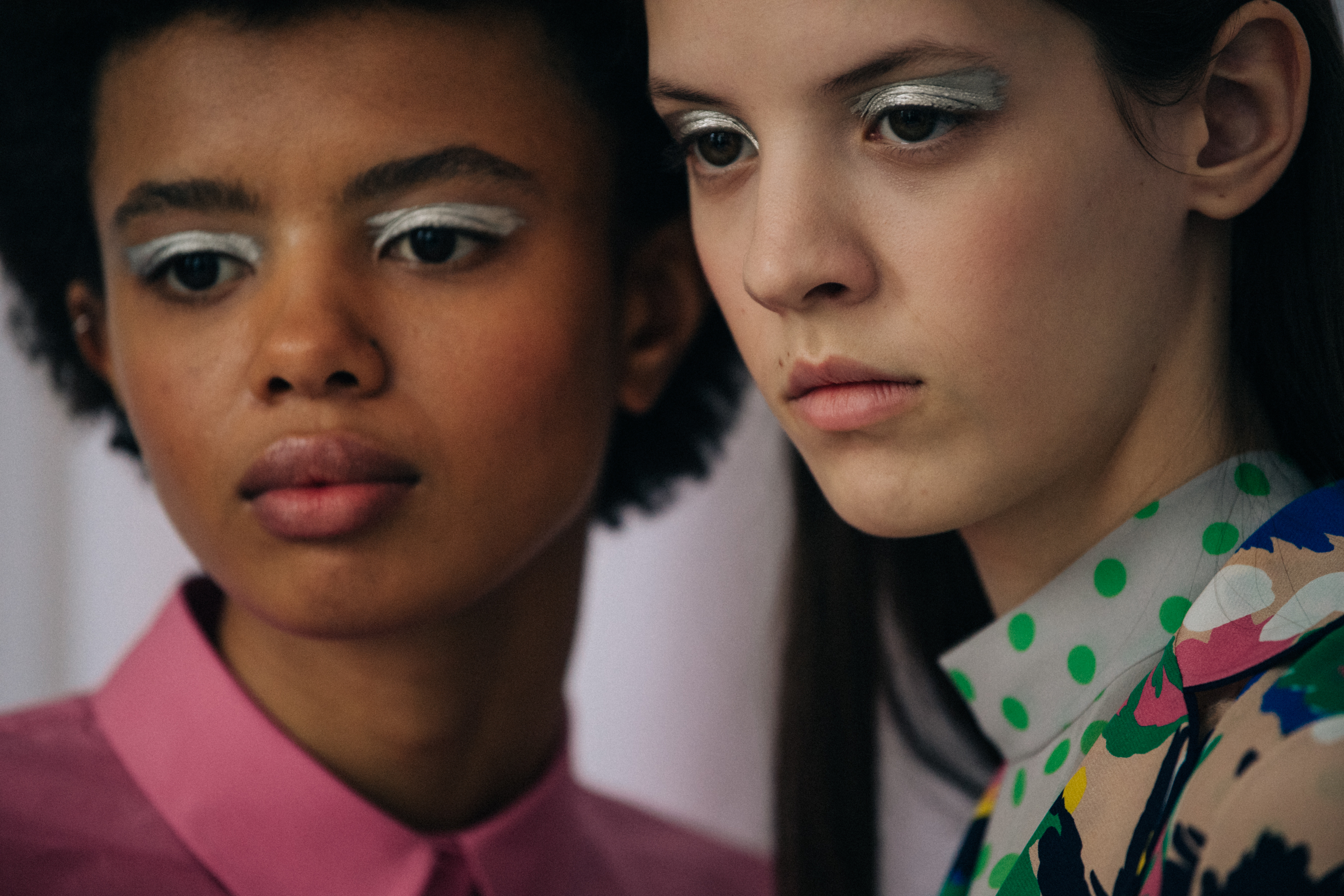 Models wearing colourful outfits at Delpozo