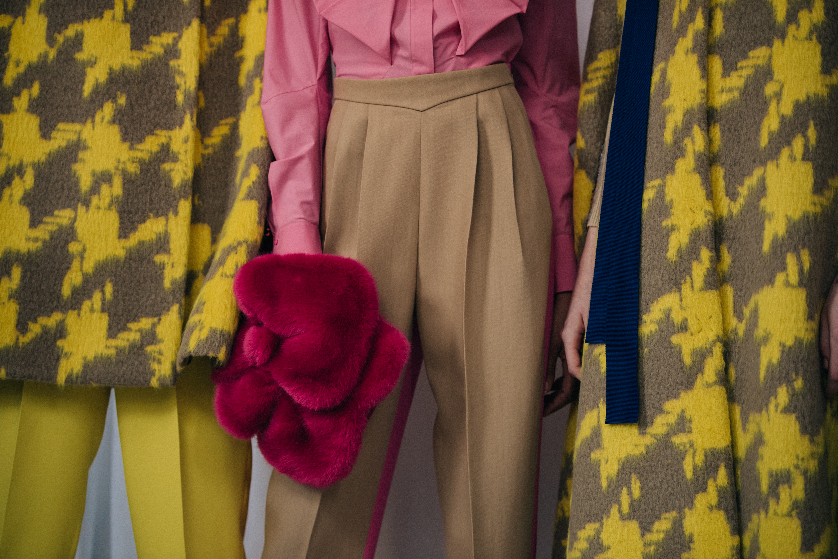 Models wearing colourful outfits at Delpozo