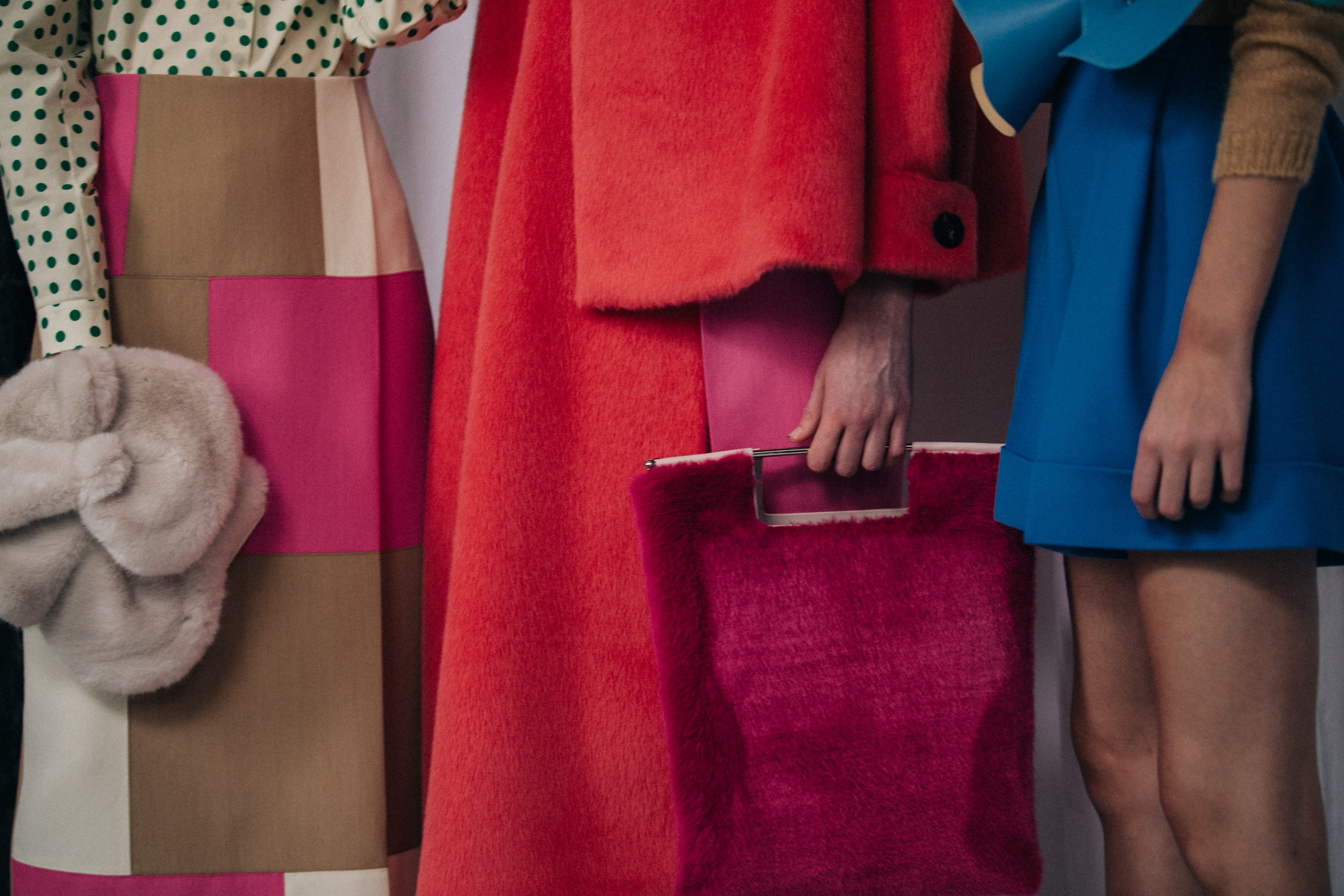 Models wearing colourful outfits at Delpozo
