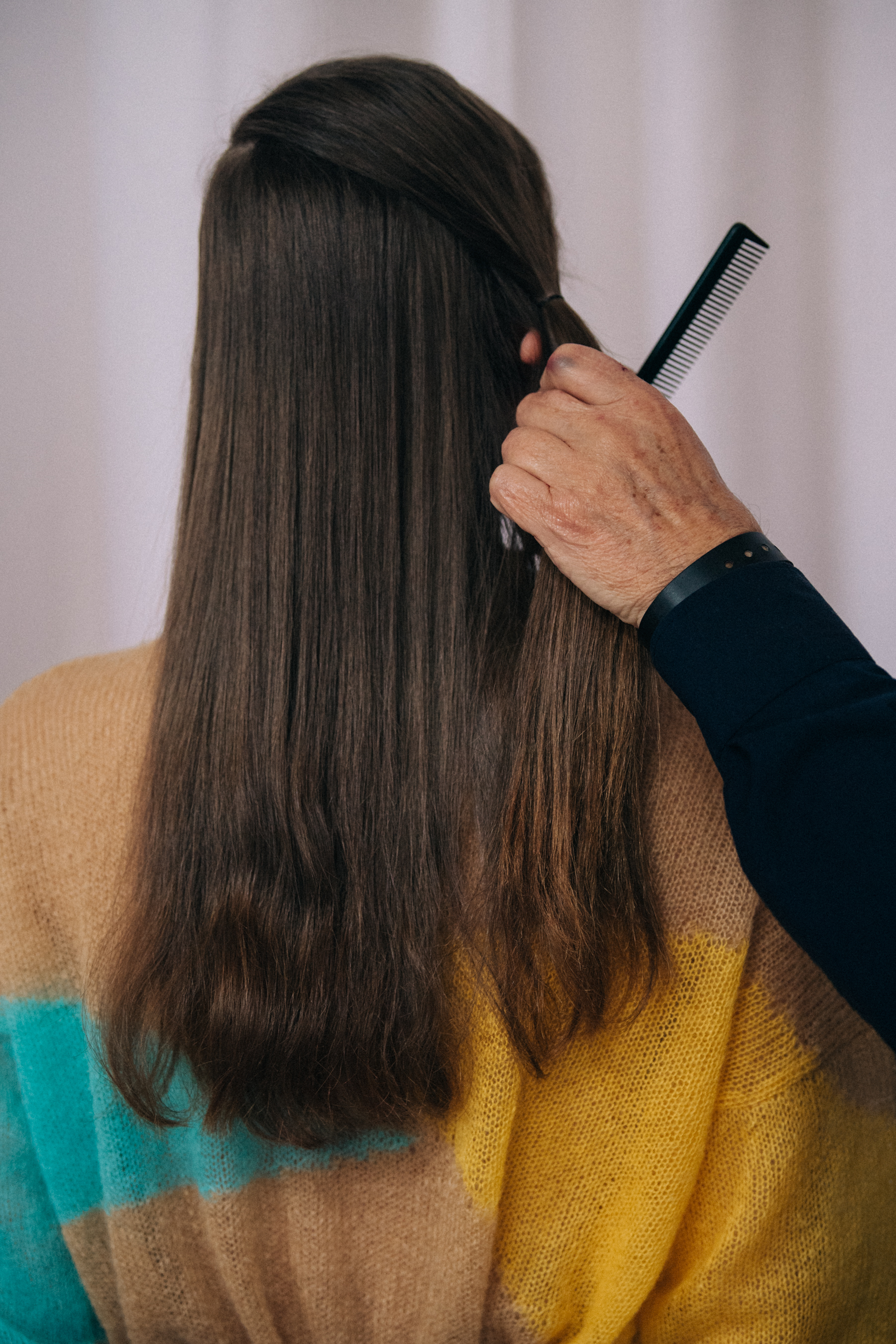 Model having hair styled