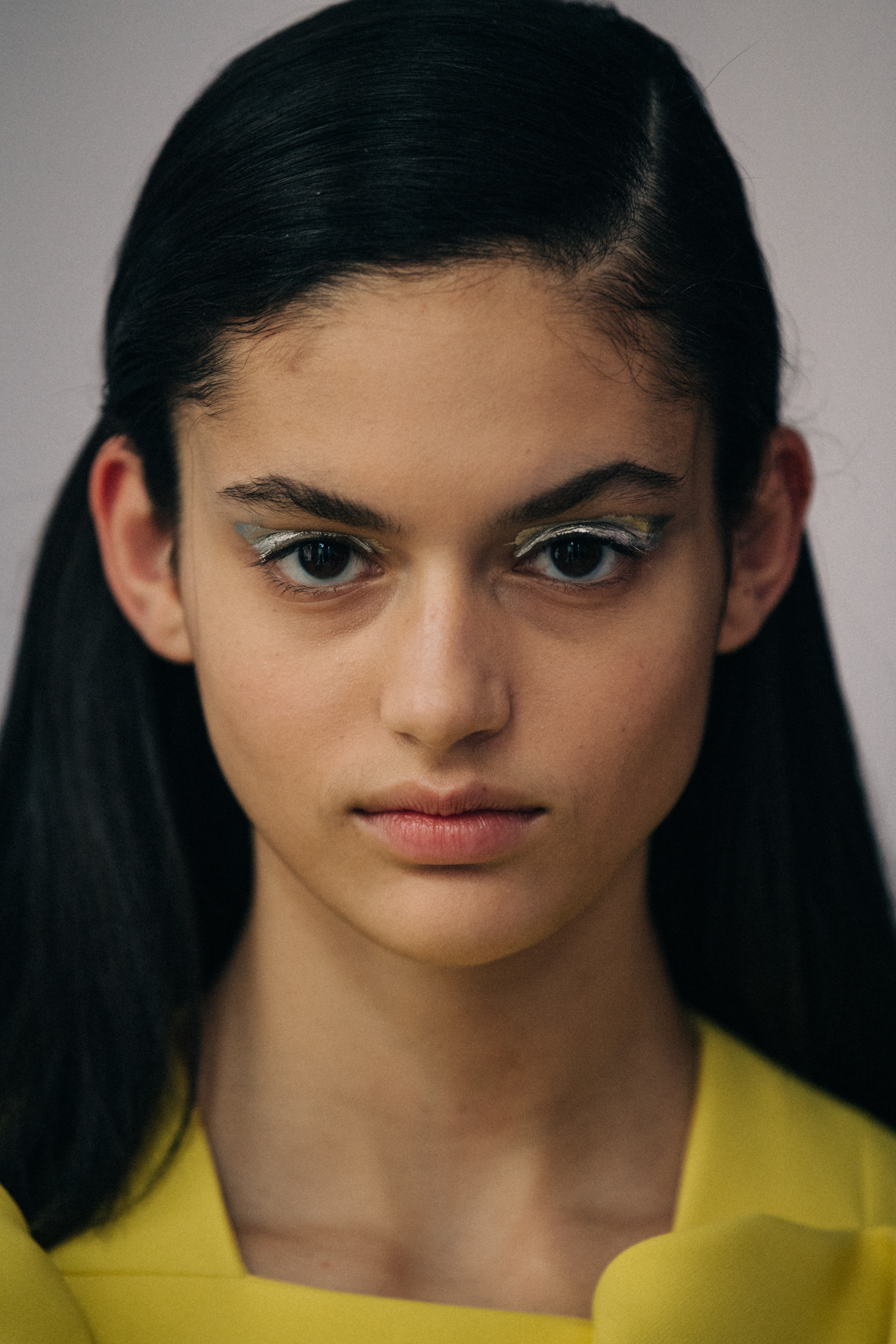 Portrait of model with silver eye shadow