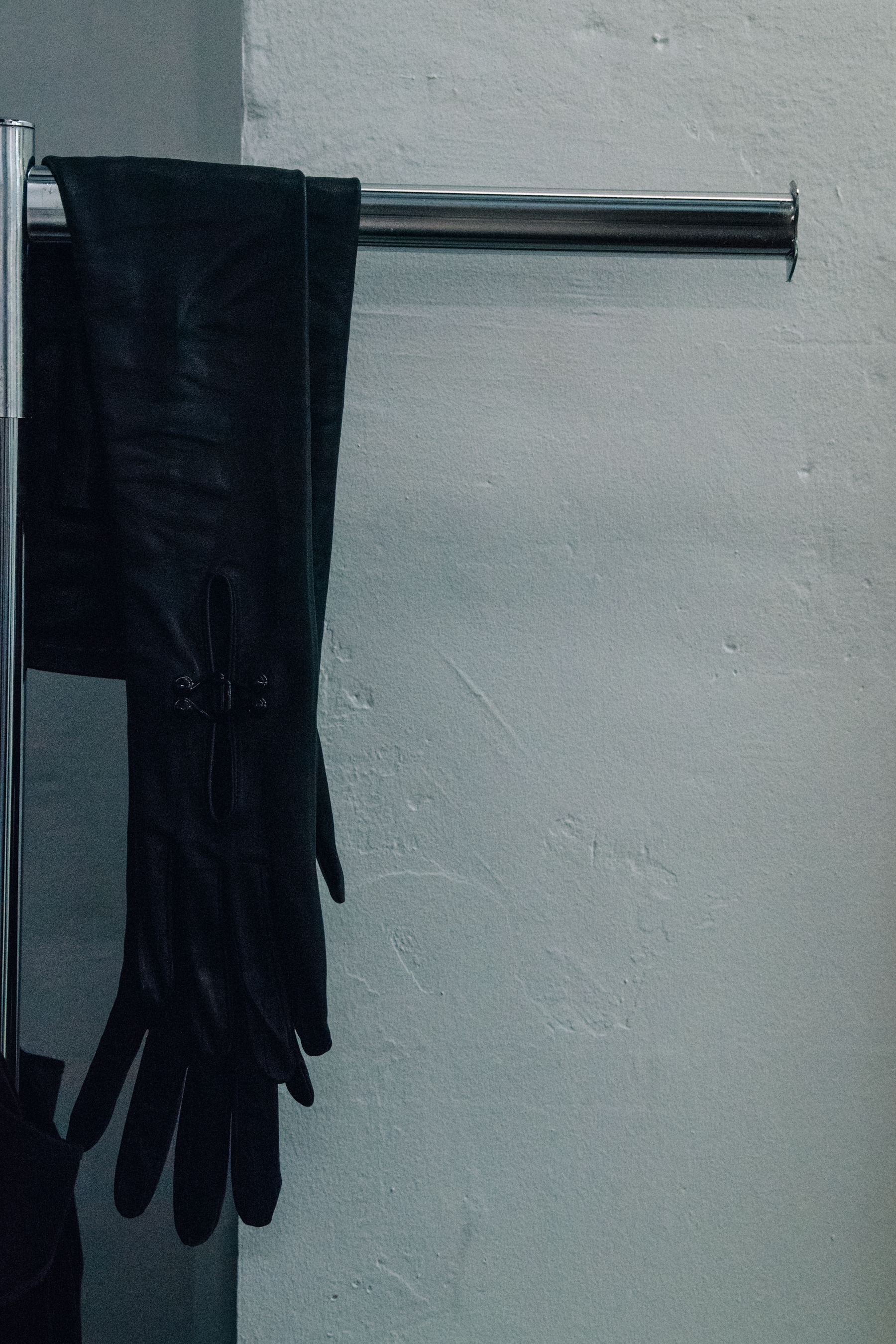 Outfits hanging backstage at Olivier Theyskens