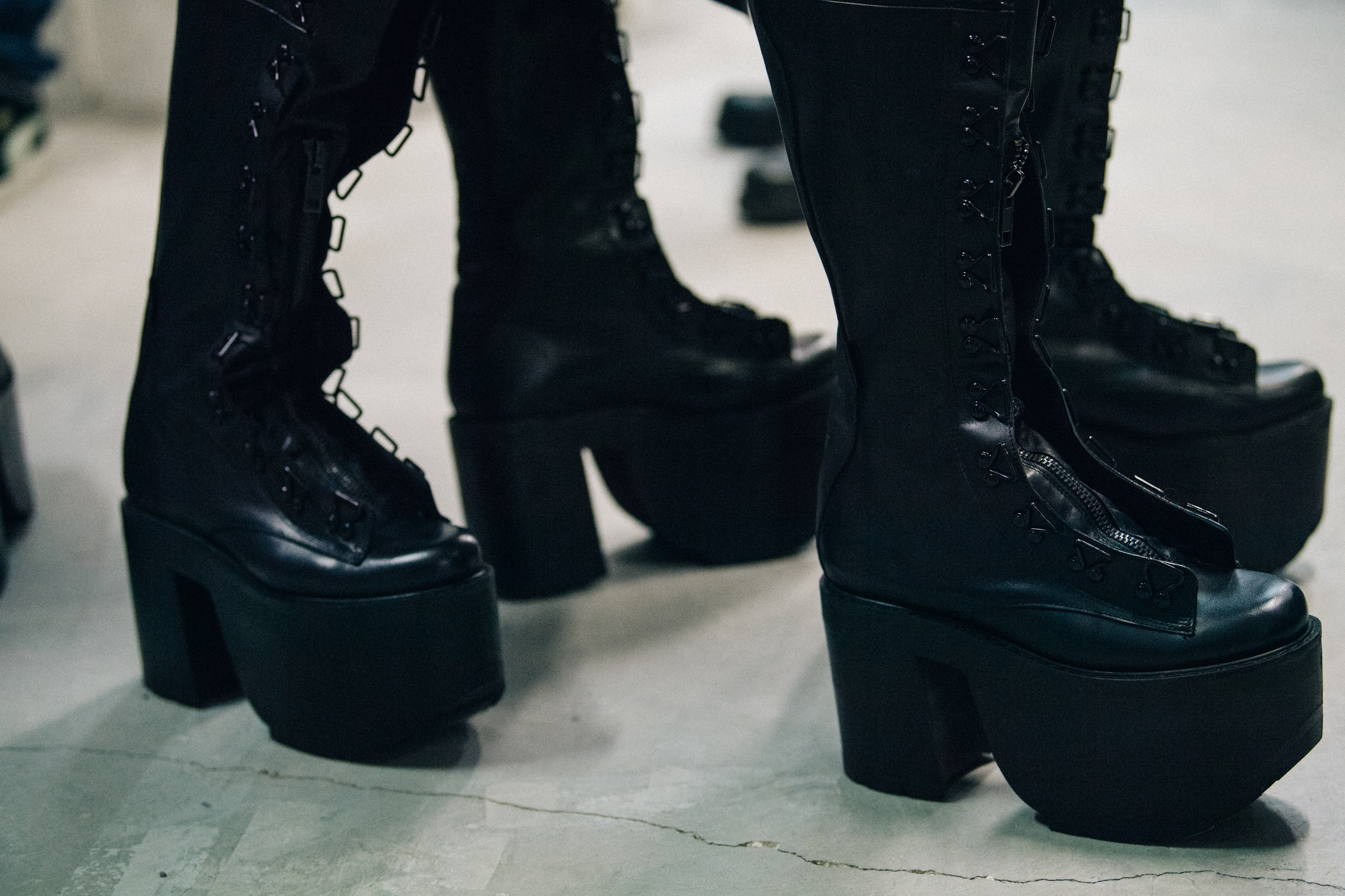 Tall black boots backstage at Olivier Theyskens