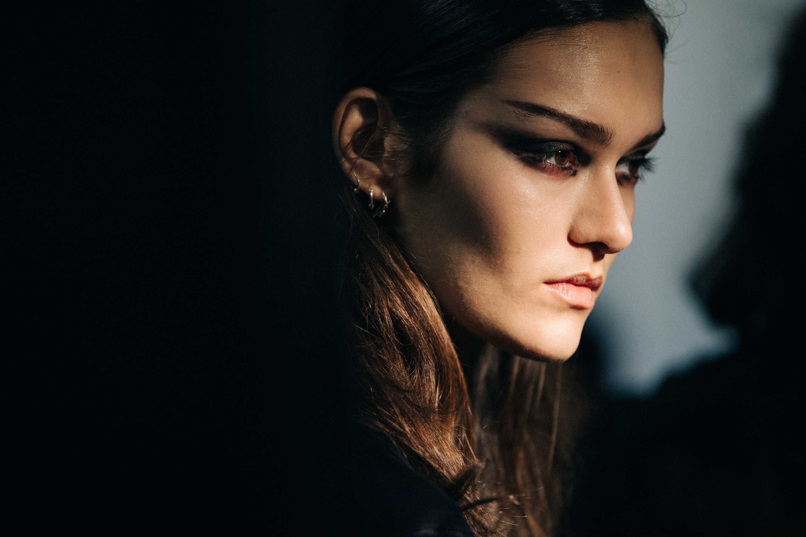 Models wearing black Olivier Theyskens outfit backstage