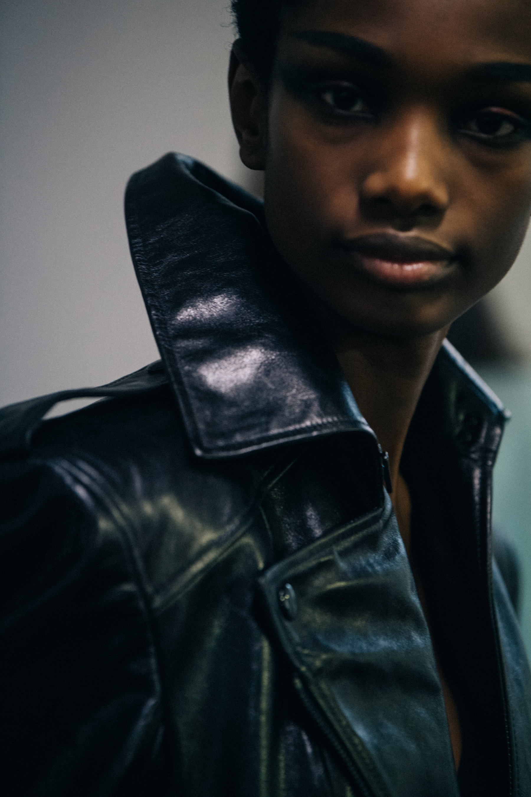 Model wearing black leather at Olivier Theyskens backstage