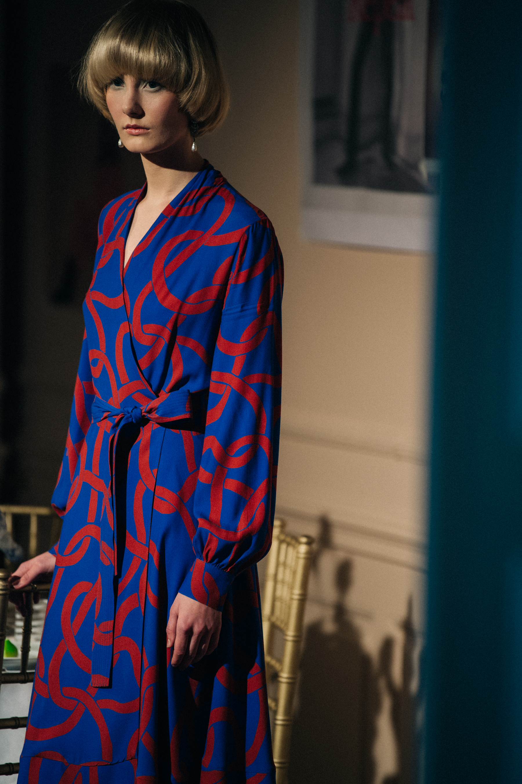 Model wearing colourful blue dress at Stine Goya