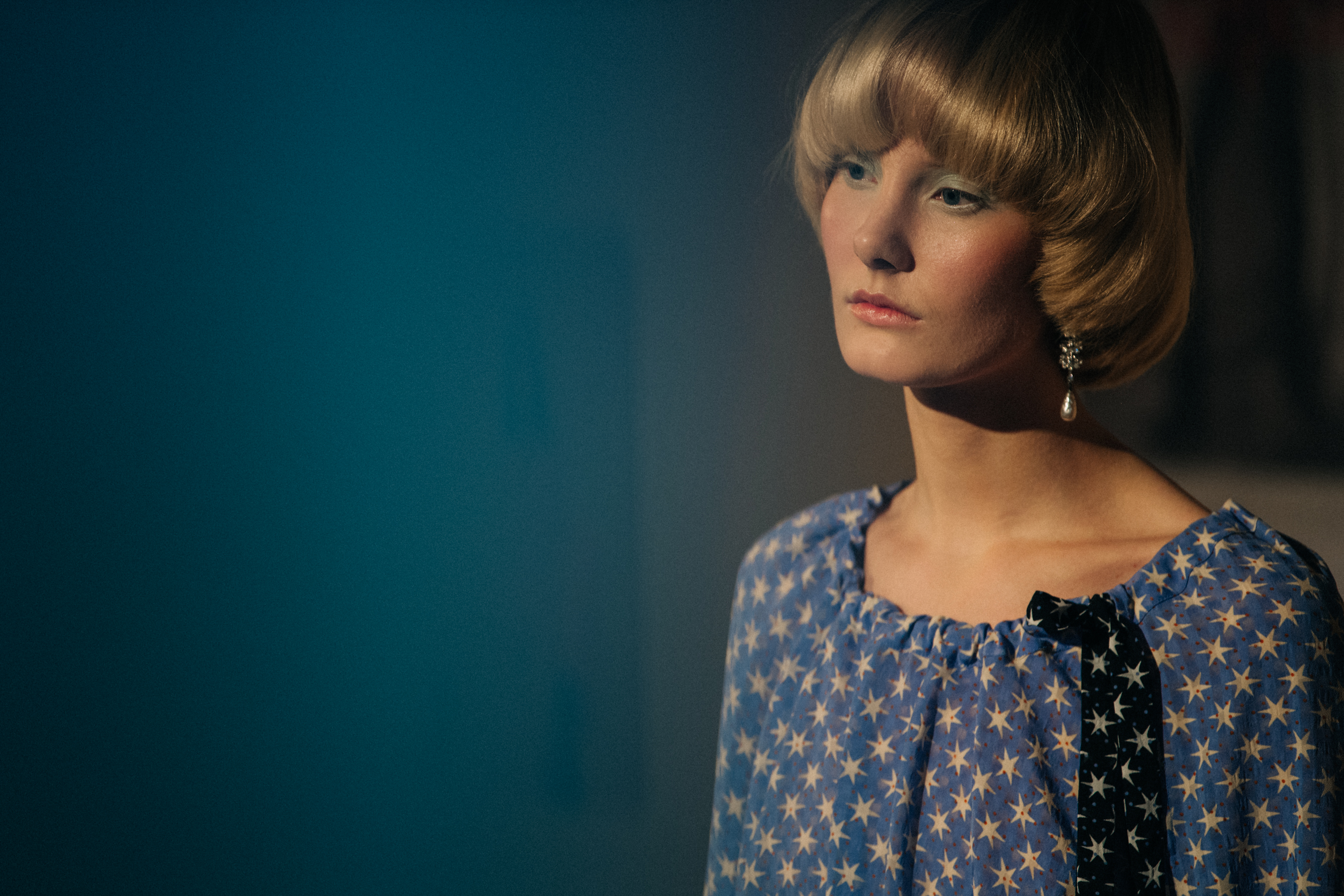 Model wearing colourful blue dress at Stine Goya