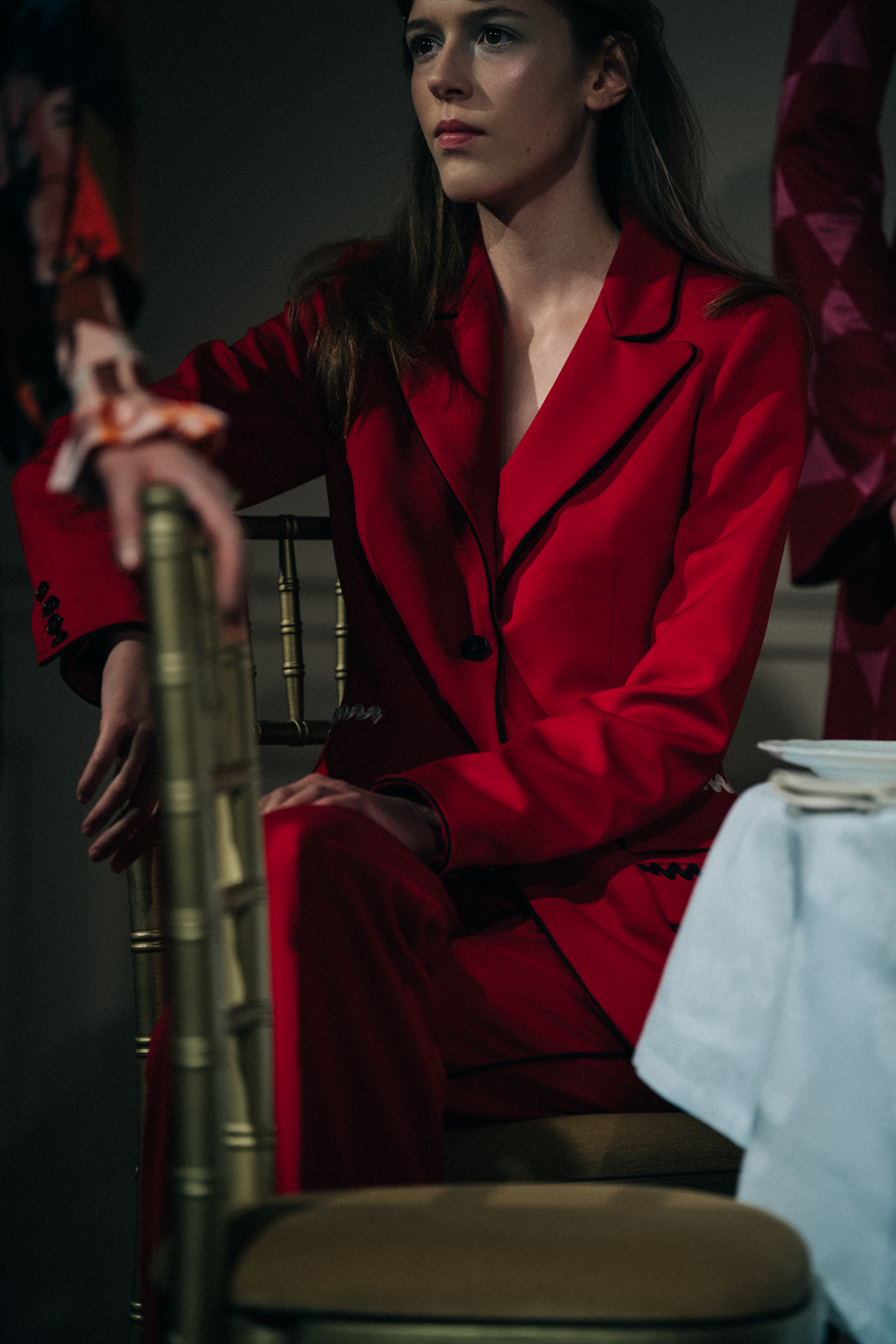 Model wearing red Stine Goya outfit