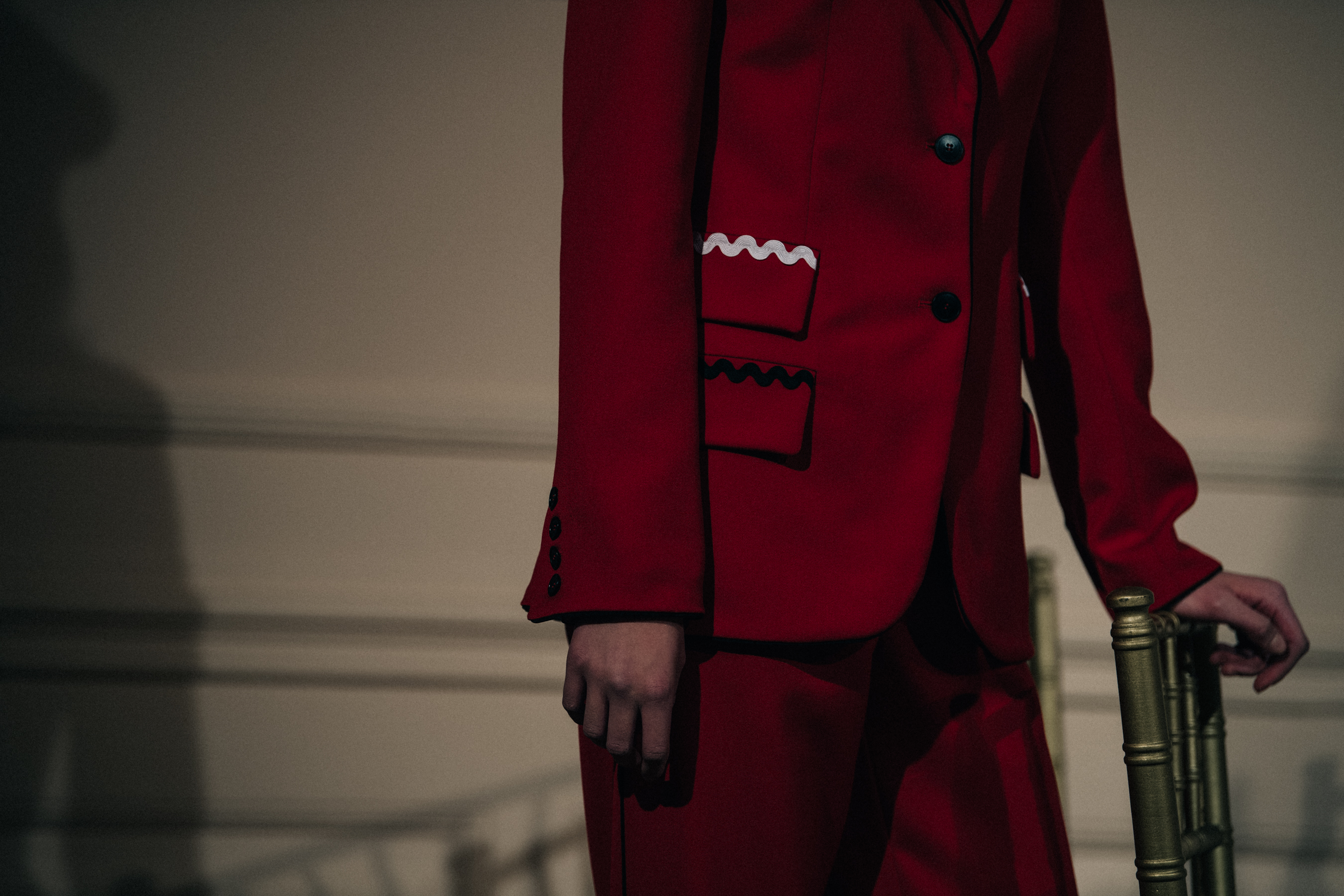 Model wearing red Stine Goya outfit