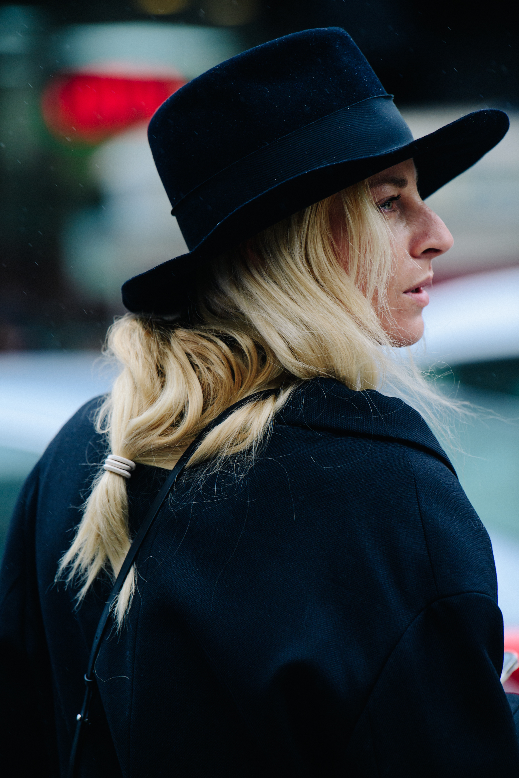 Woman wearing black hat