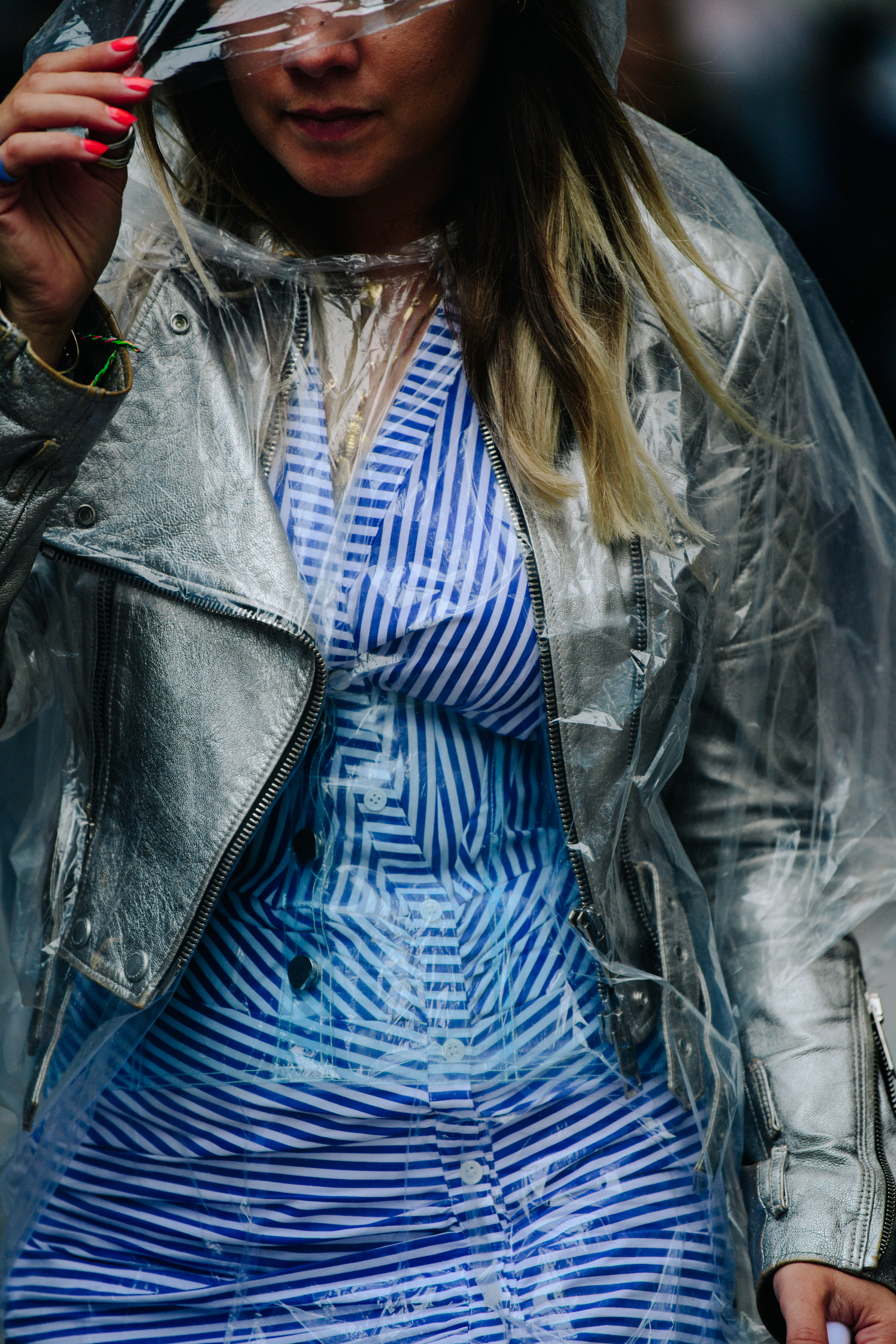 Woman wearing blue striped top