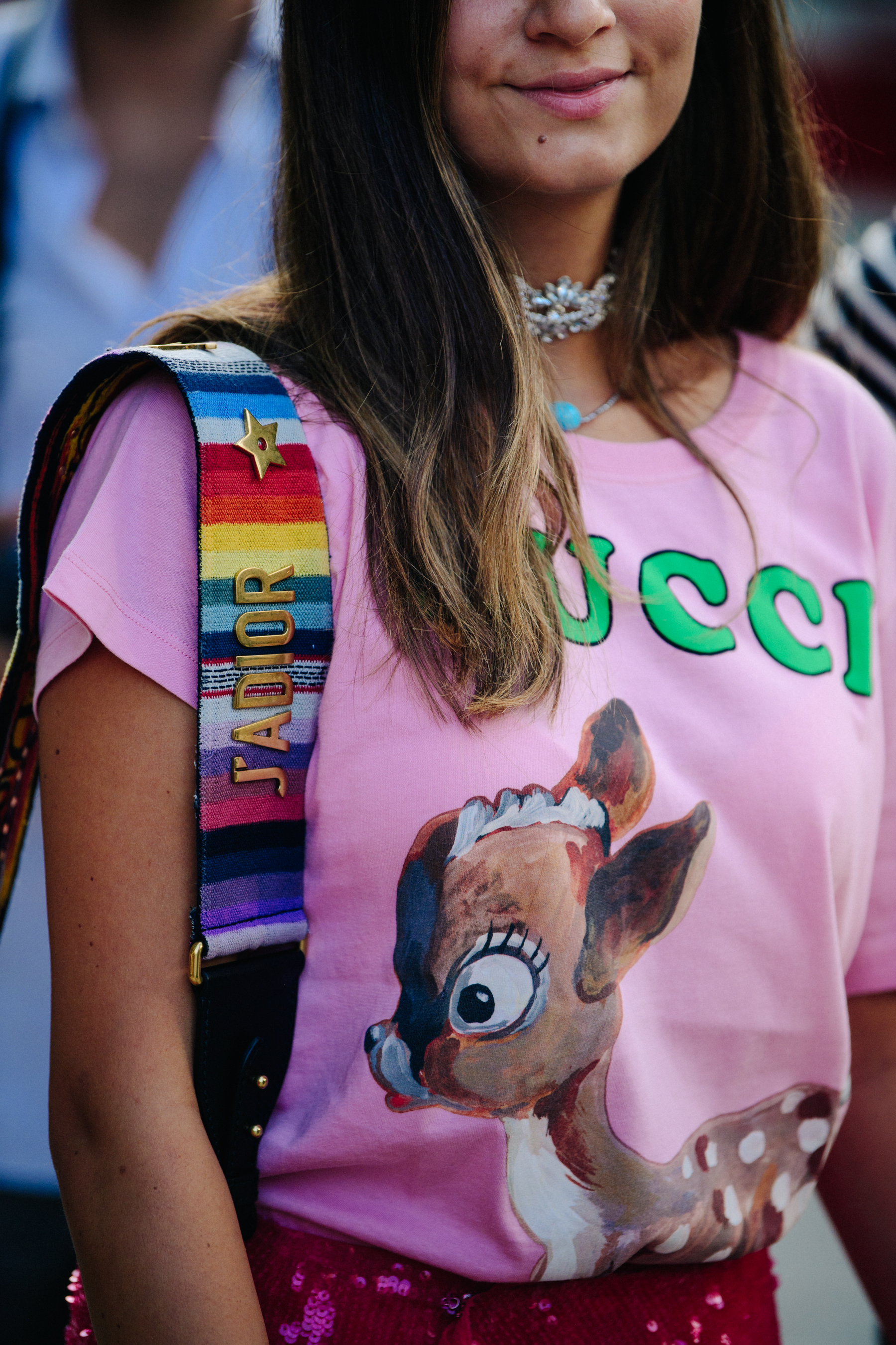 Woman wearing Dior bag